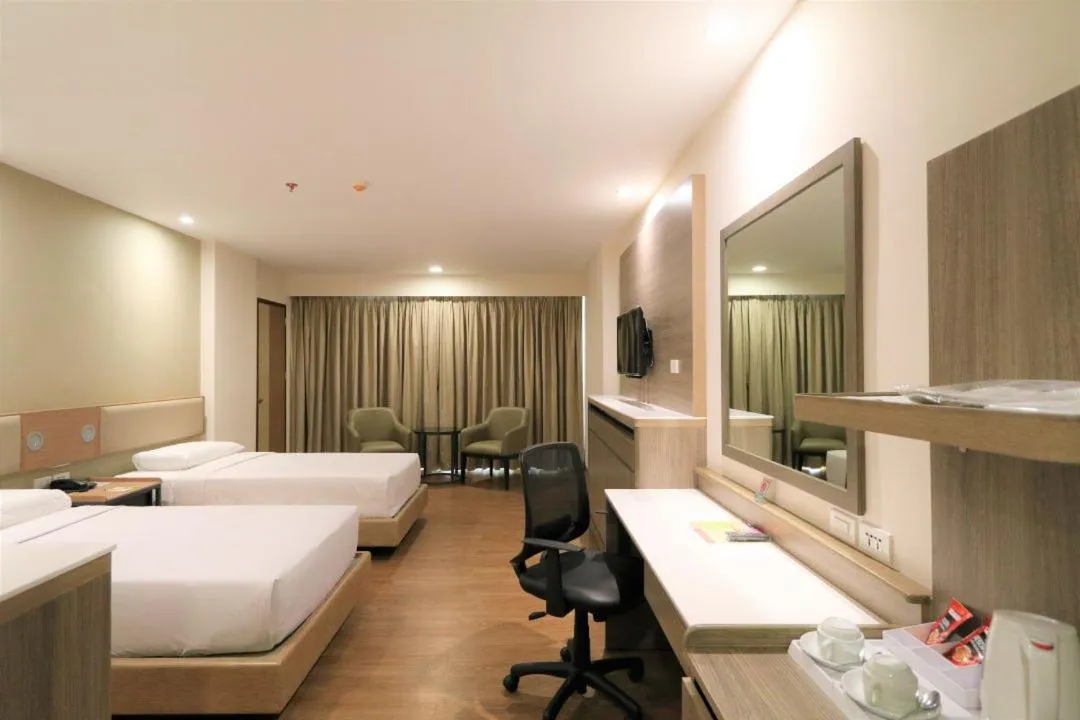 Bed in Garden Orchid Hotel & Resort Corp.