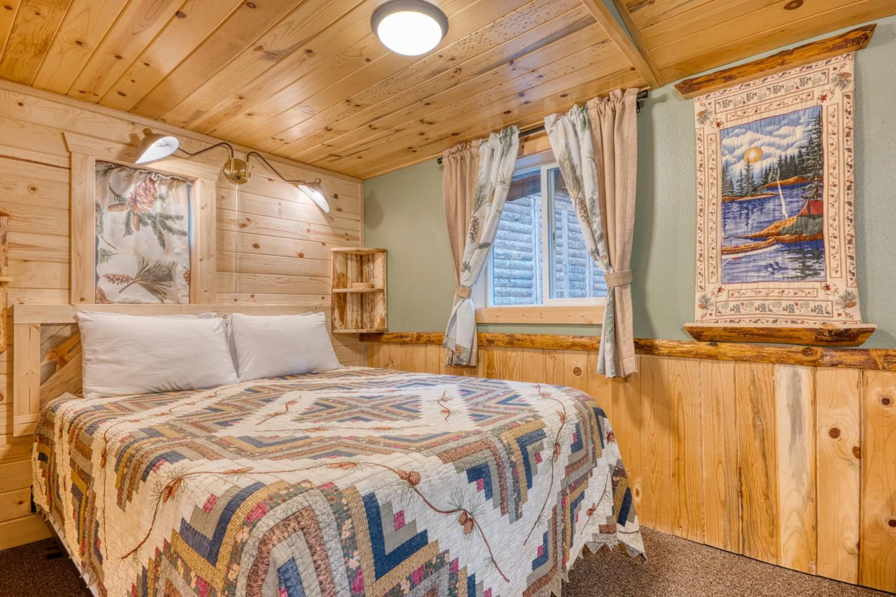 Bed in Pine Haven Resort