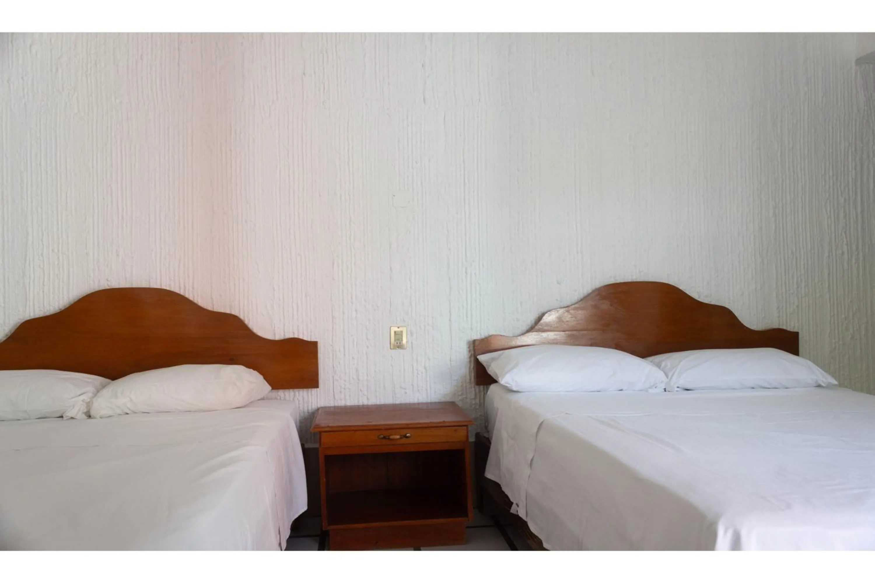 Bedroom in OYO Hotel San Felipe Inn