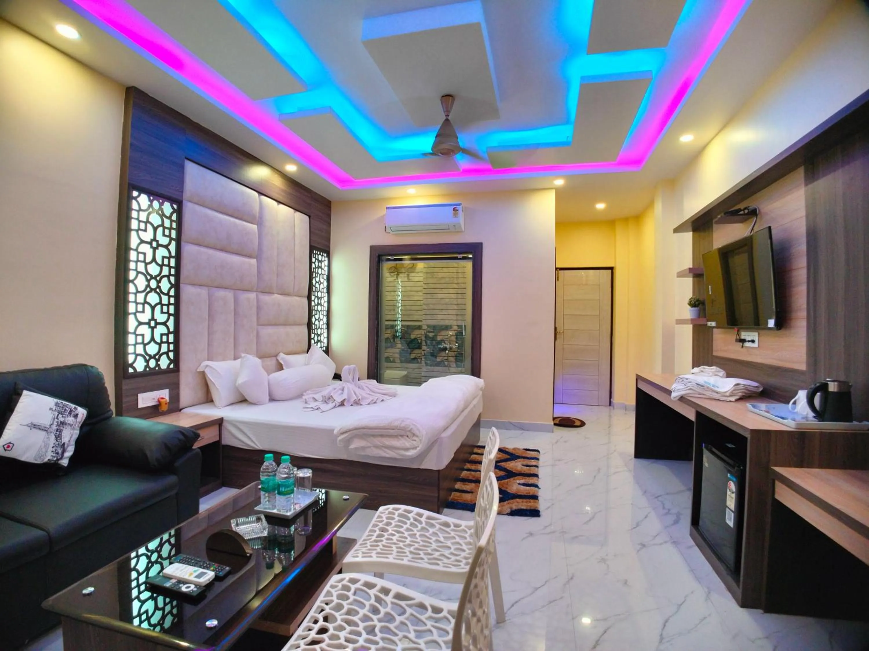 Bed in The Triton Beach Resort