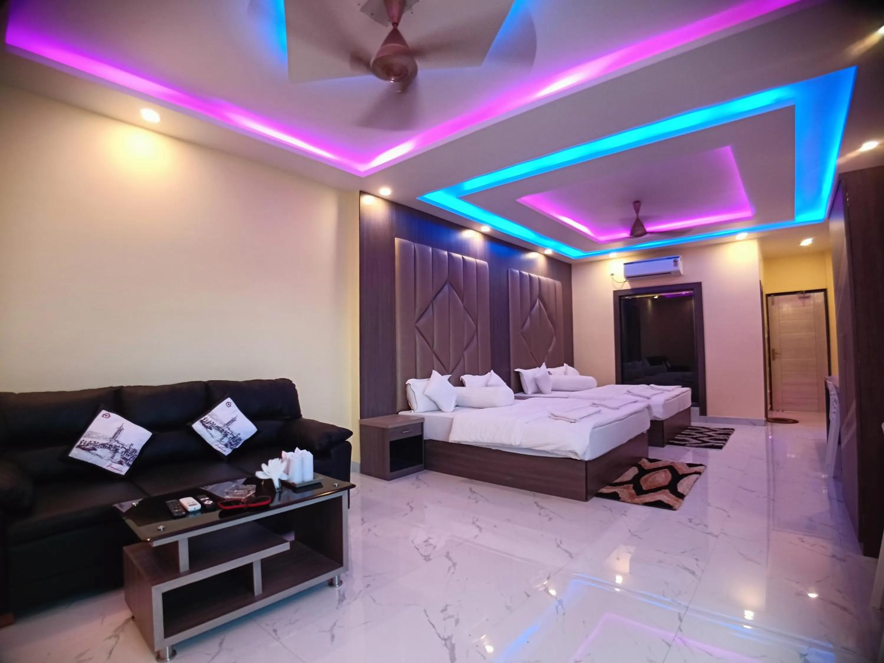 Bed in The Triton Beach Resort