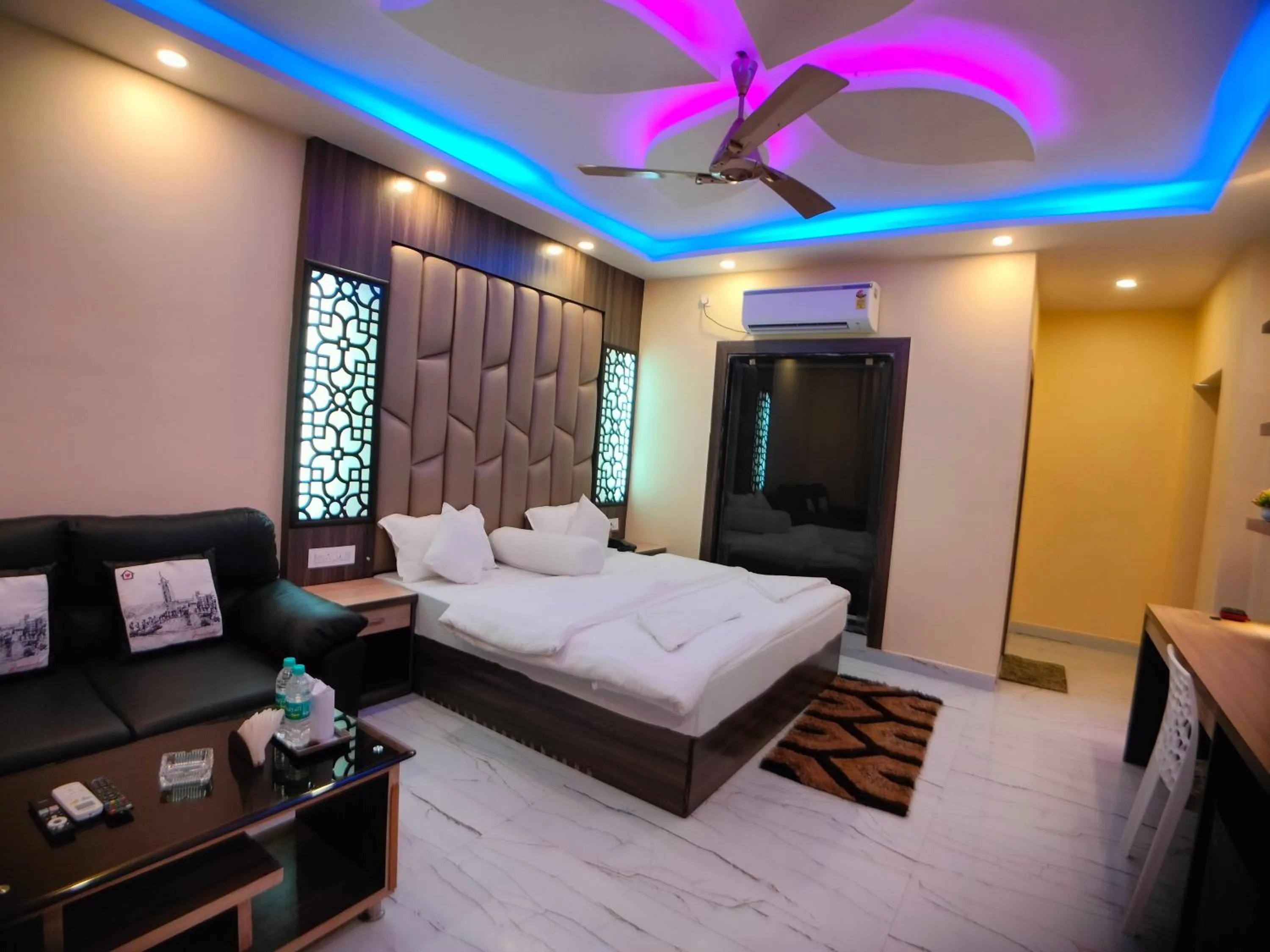 Photo of the whole room, Bed in The Triton Beach Resort