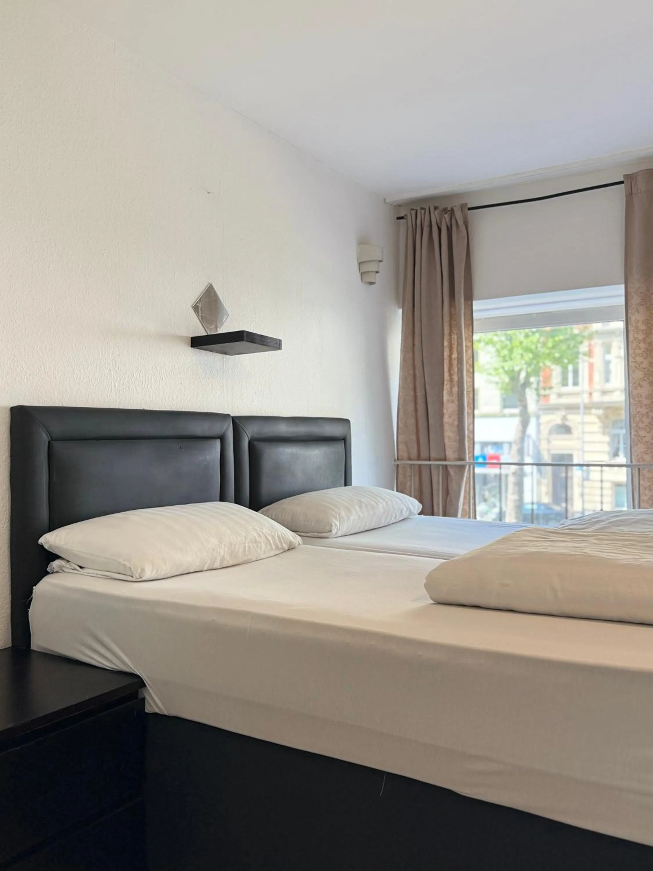 Bed in Hotel Garni Emir