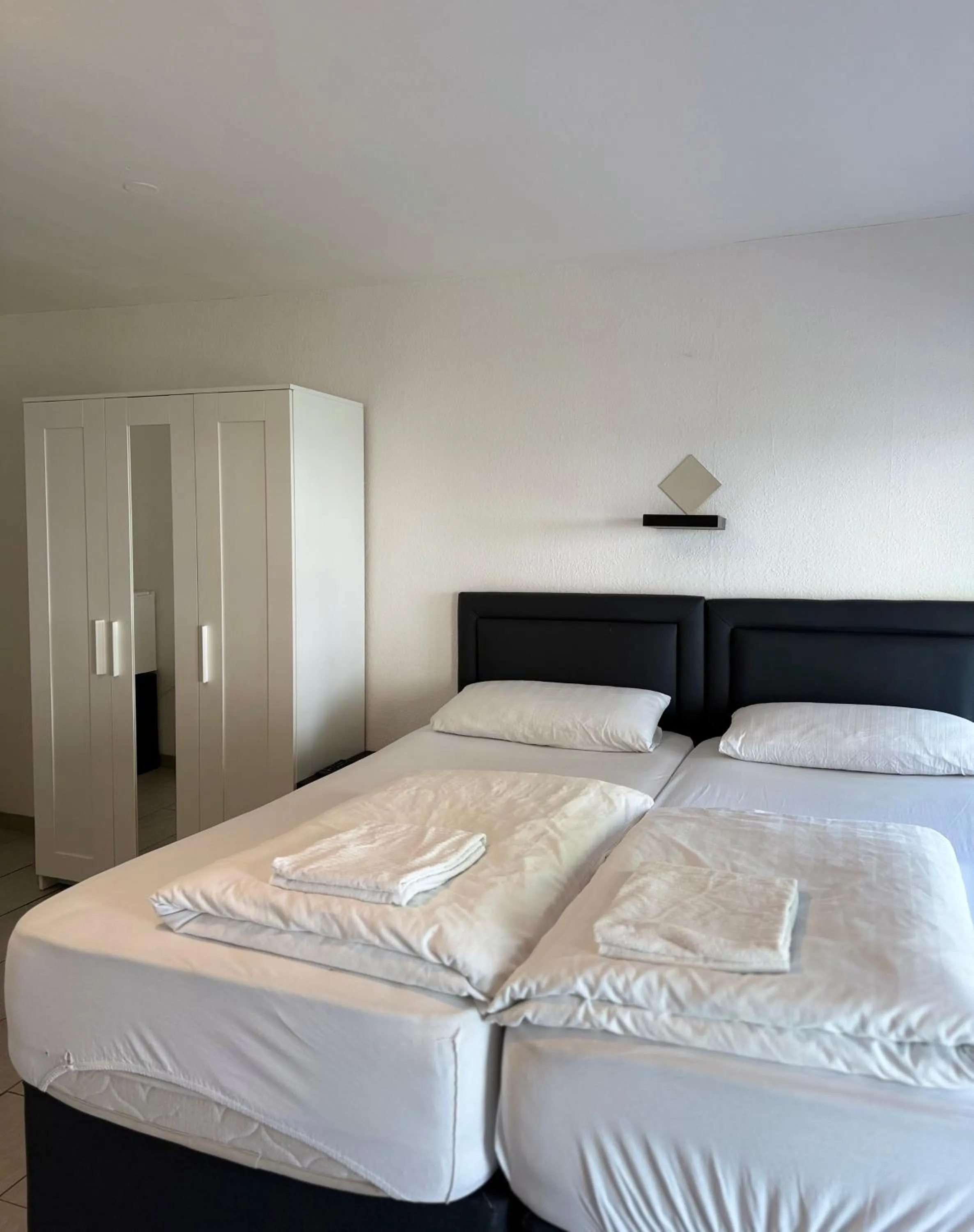 Bed in Hotel Garni Emir