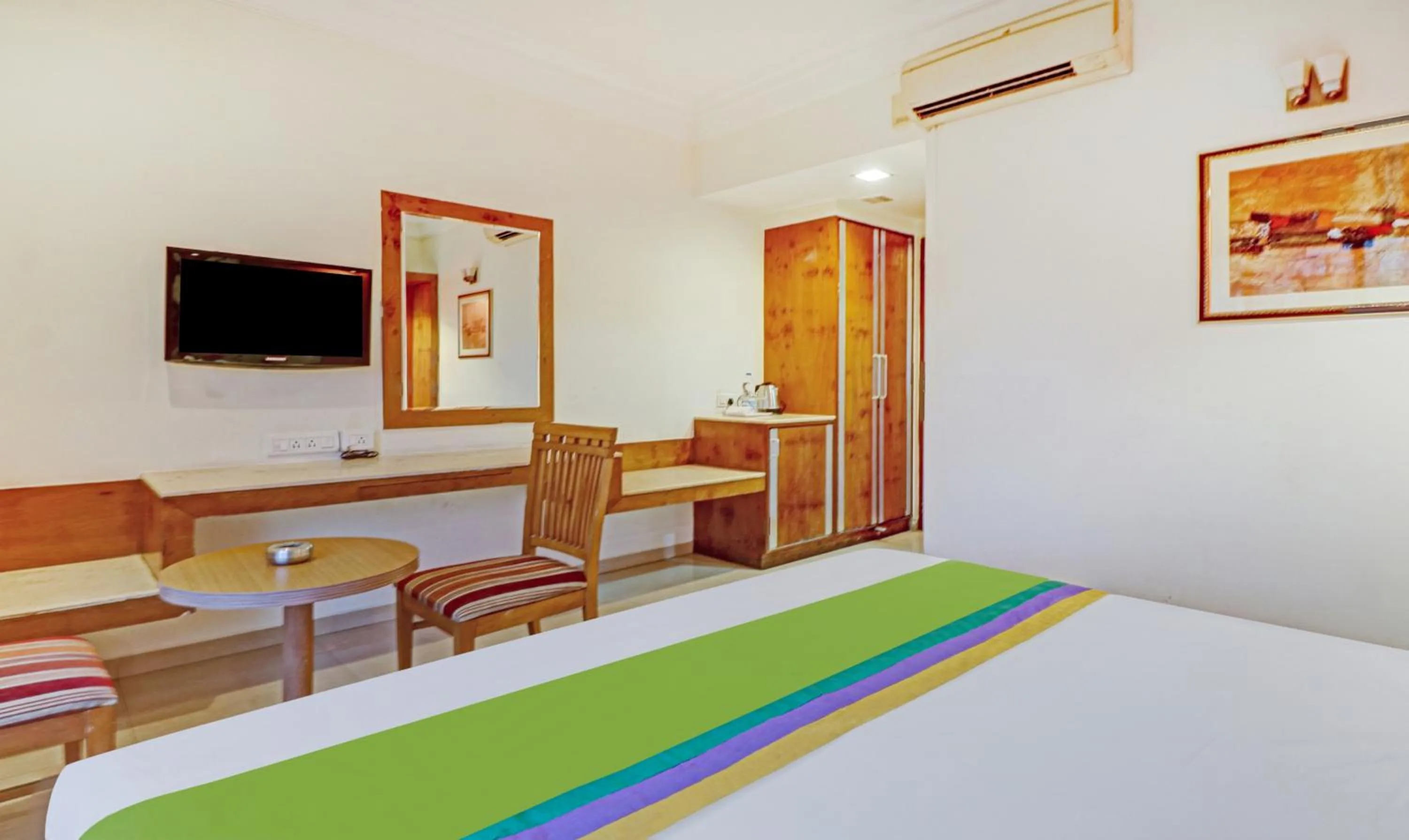 Bedroom, Bed in Treebo Suraksha Inn