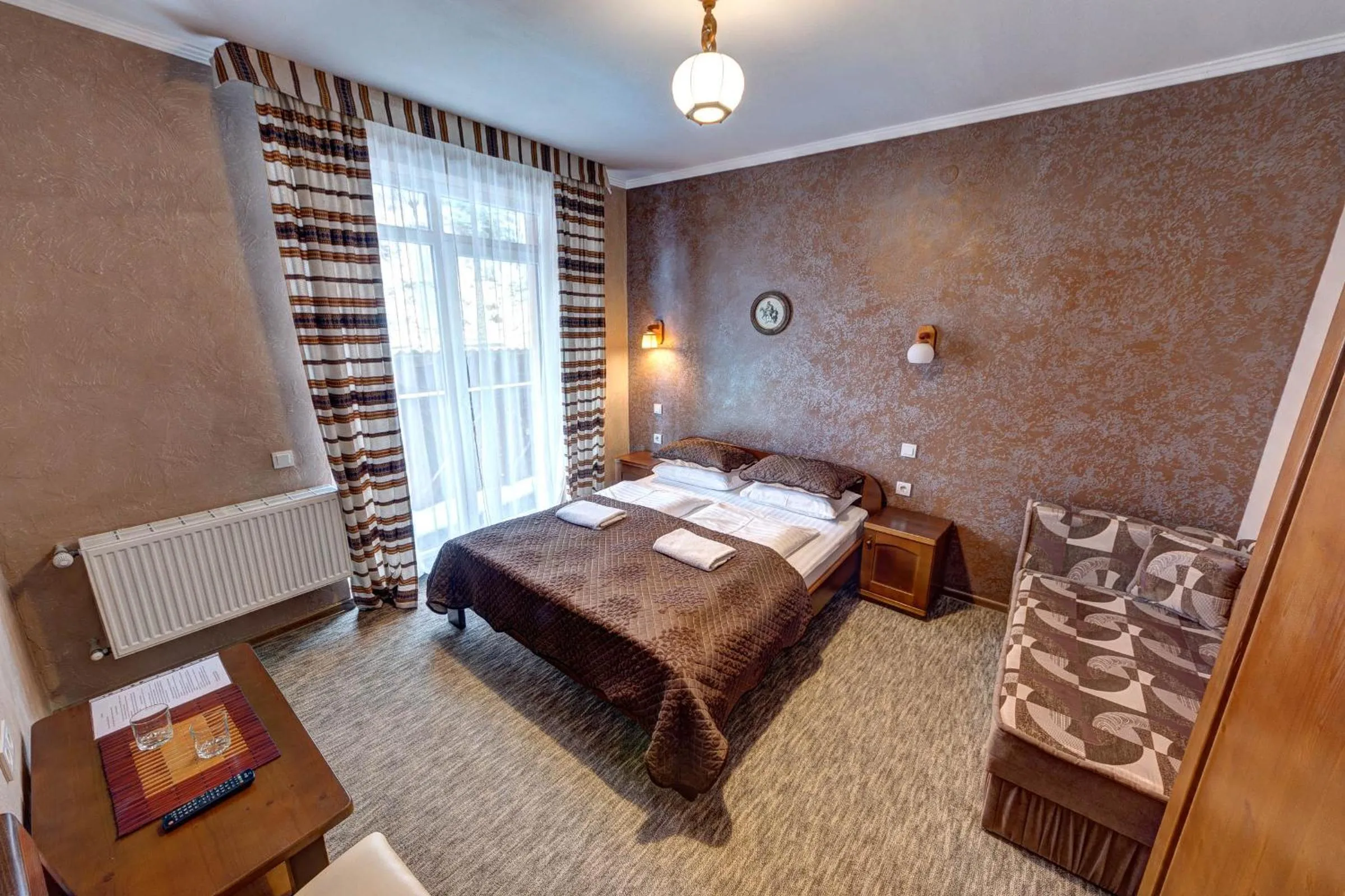 Bed in Hotel Gutsulia