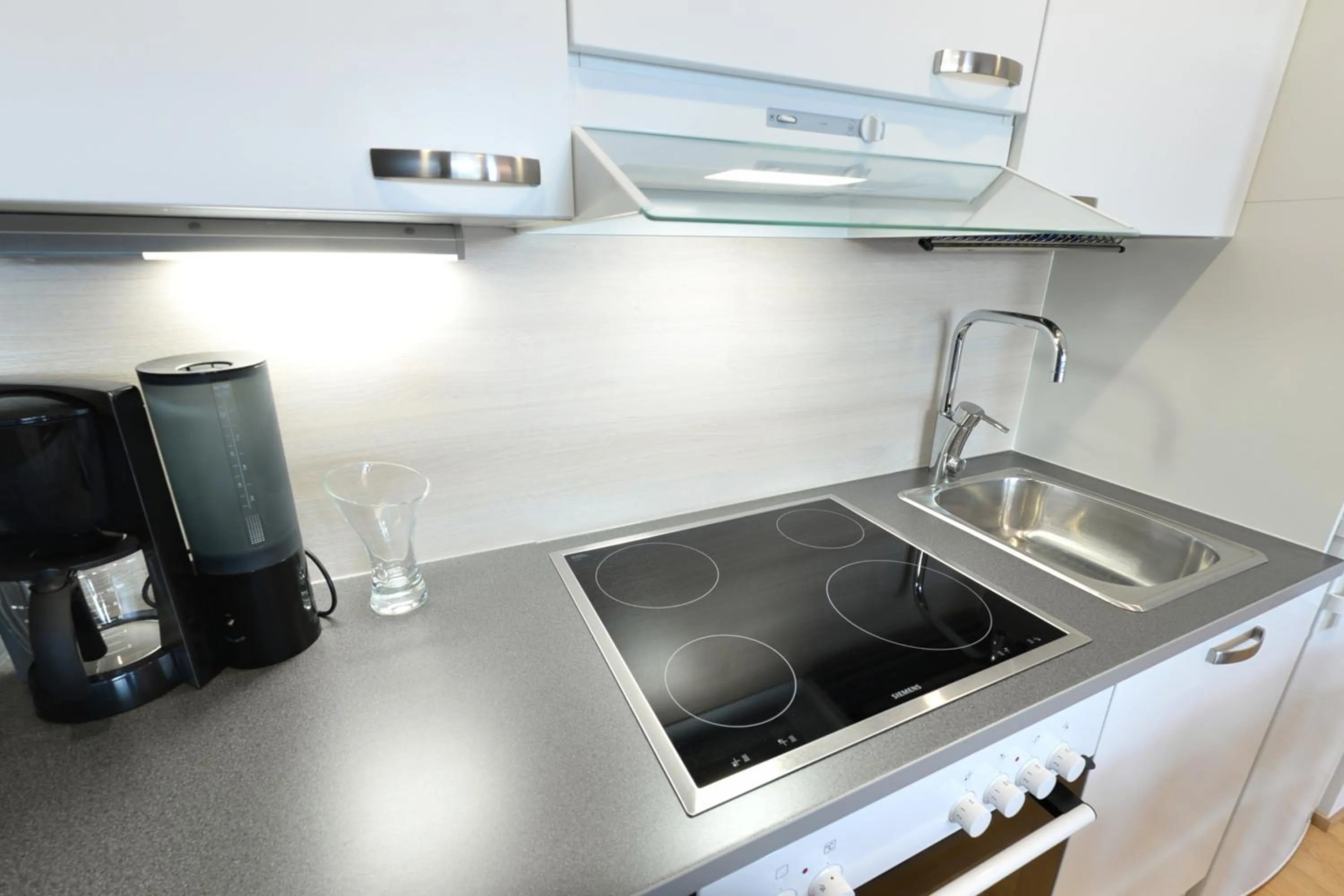 Kitchen or kitchenette in Forenom Serviced Apartments Tampere Pyynikki