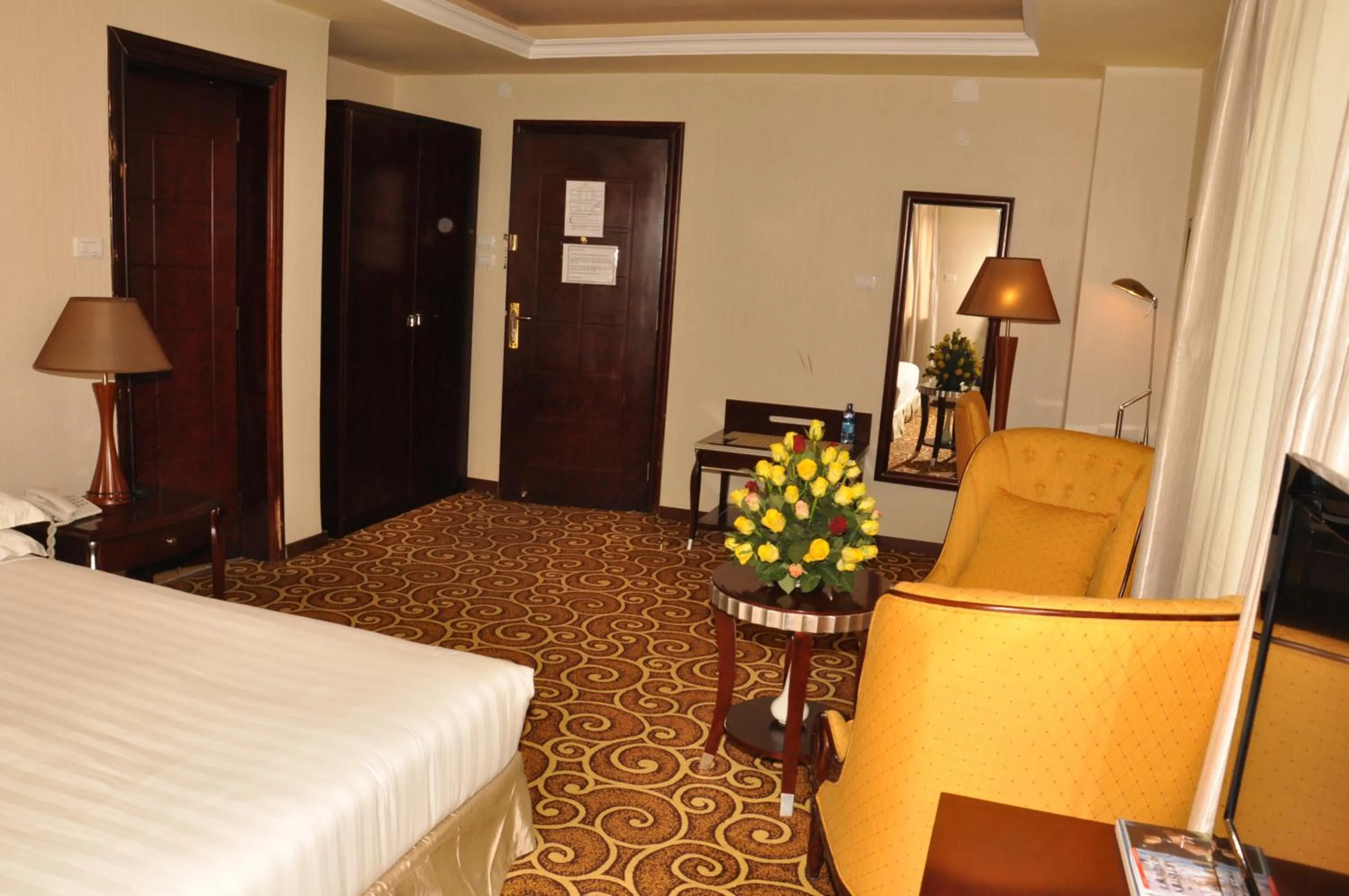 Photo of the whole room, Bed in Ambassador Hotel