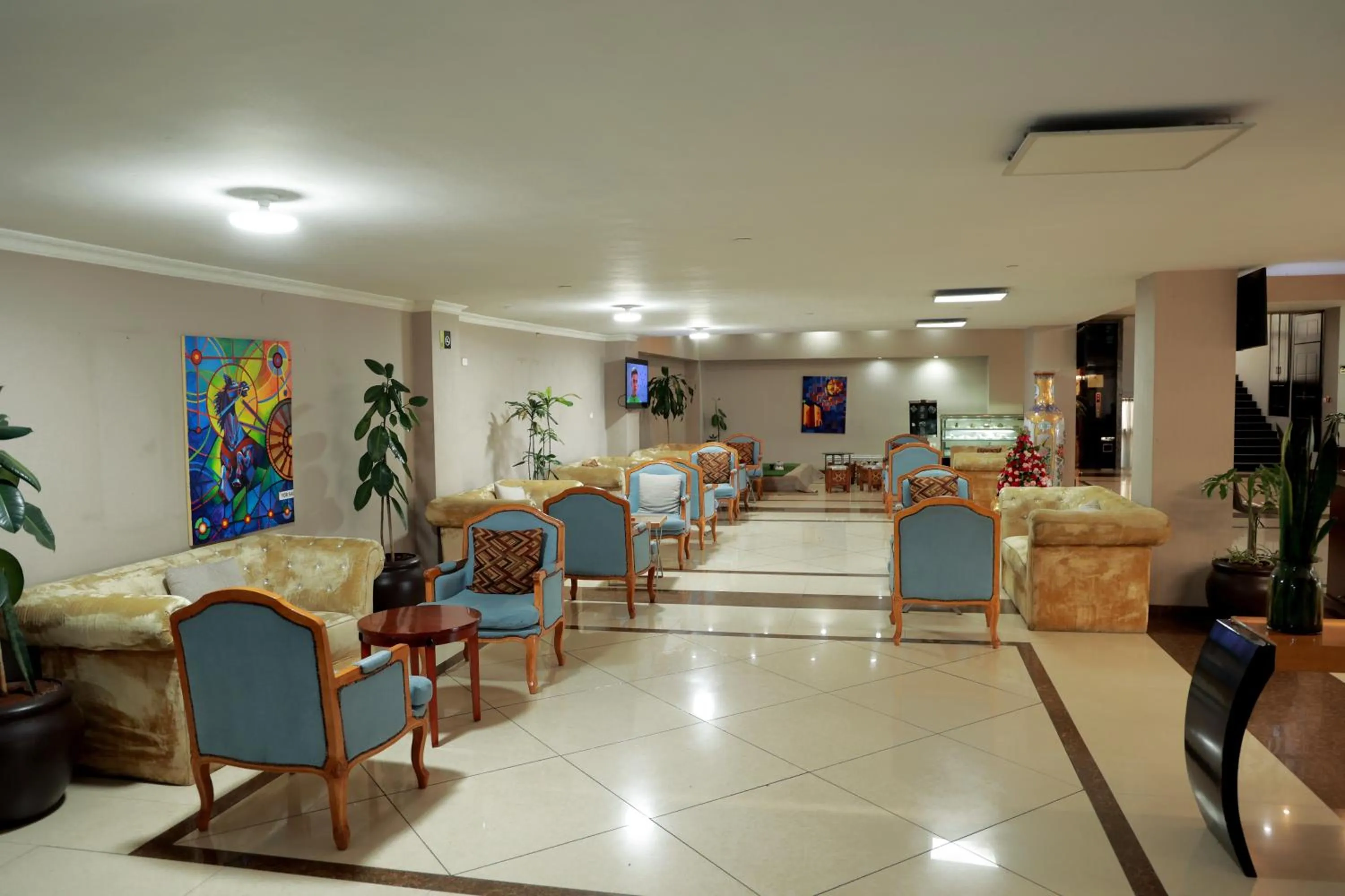 Lobby or reception in Ambassador Hotel