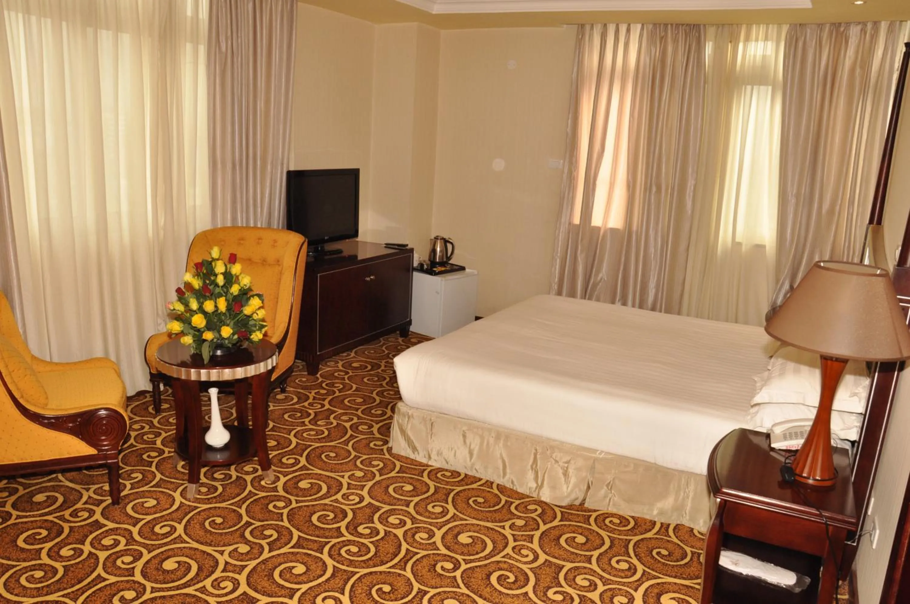 Photo of the whole room, Bed in Ambassador Hotel