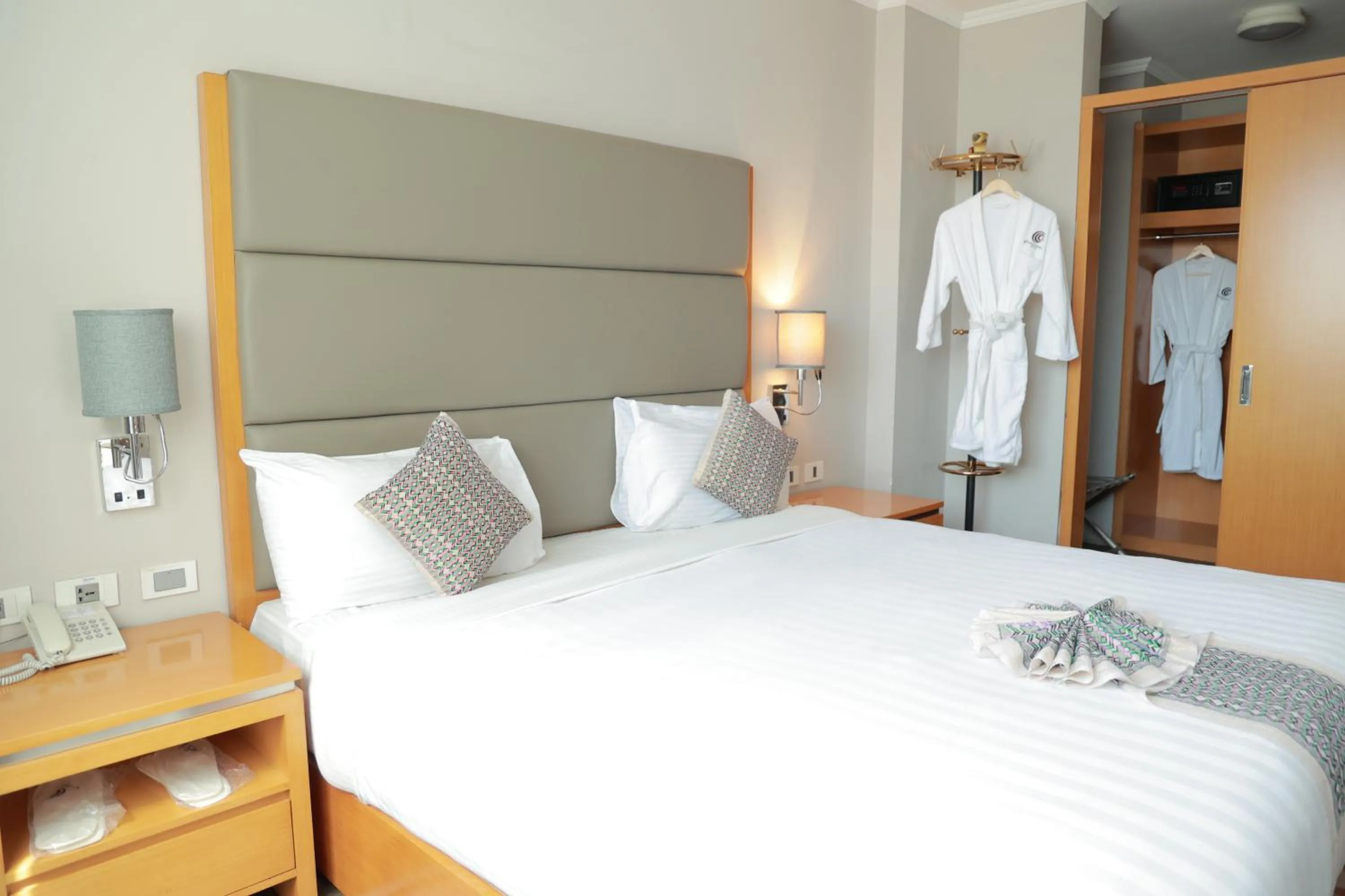 Bed in Ambassador Hotel