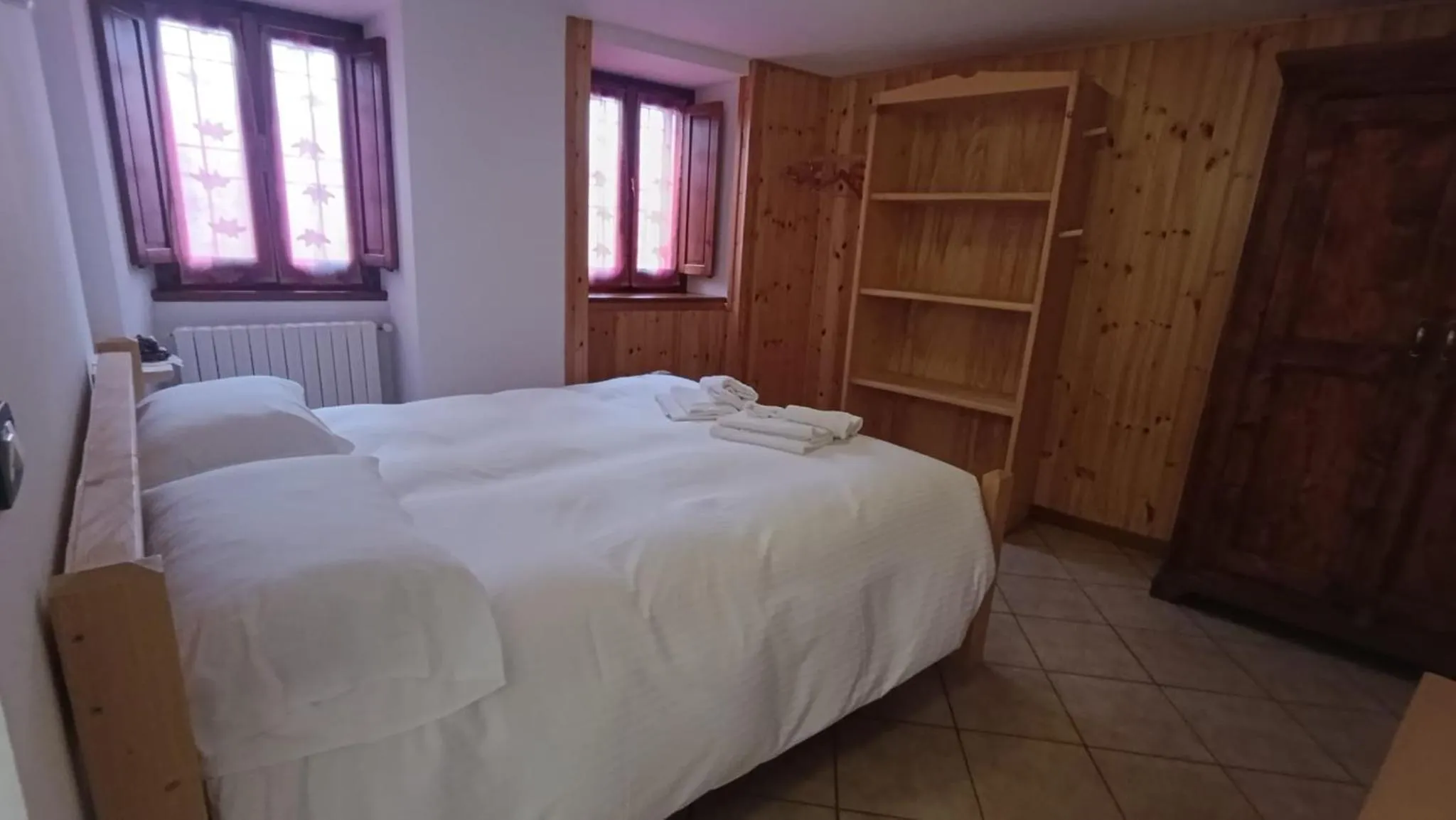 Bed in ALBERGO DIFFUSO ORNICA NEL CUORE