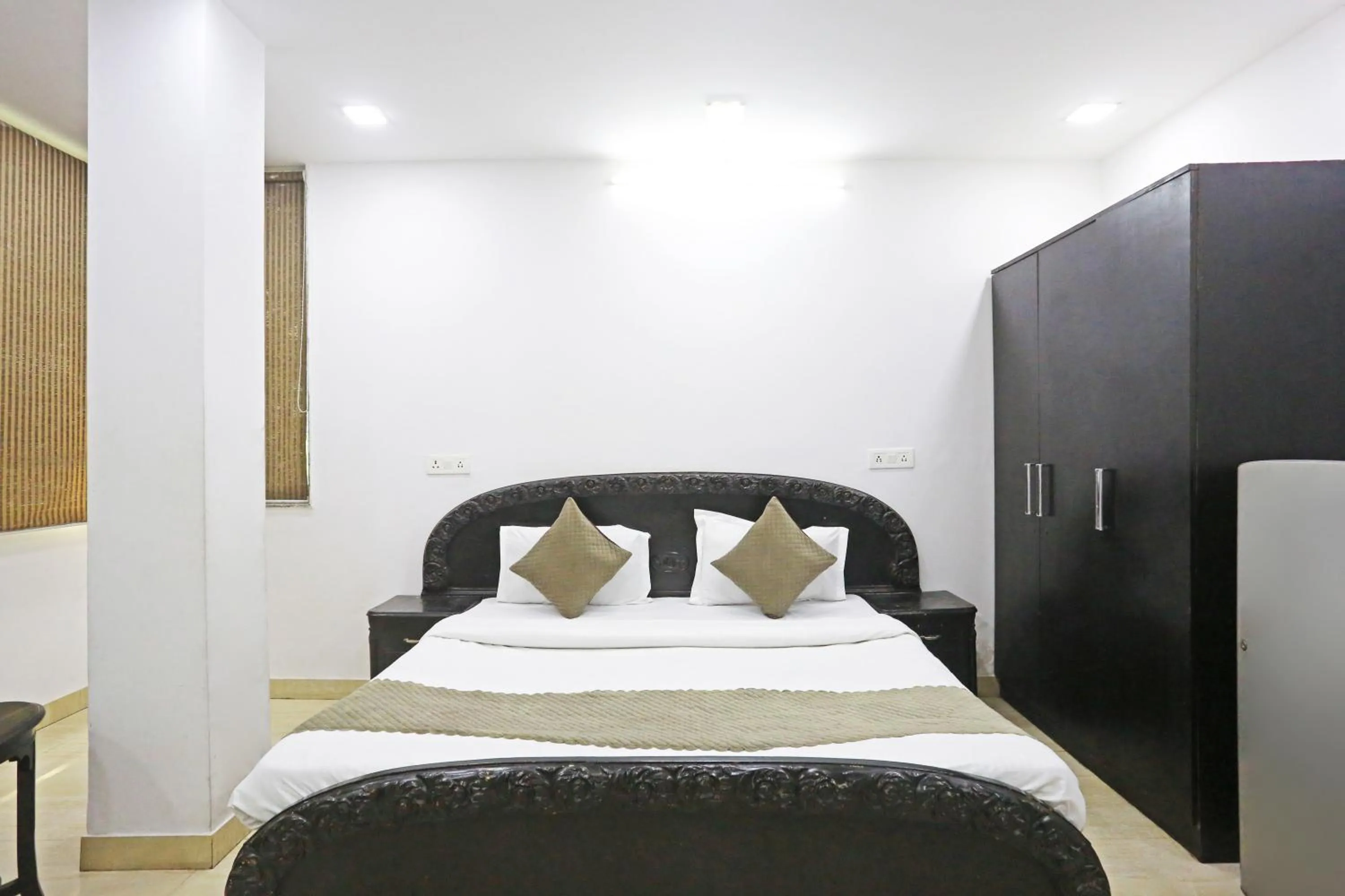 Bed in Mauryan Elite Hotel Lajpat Nager