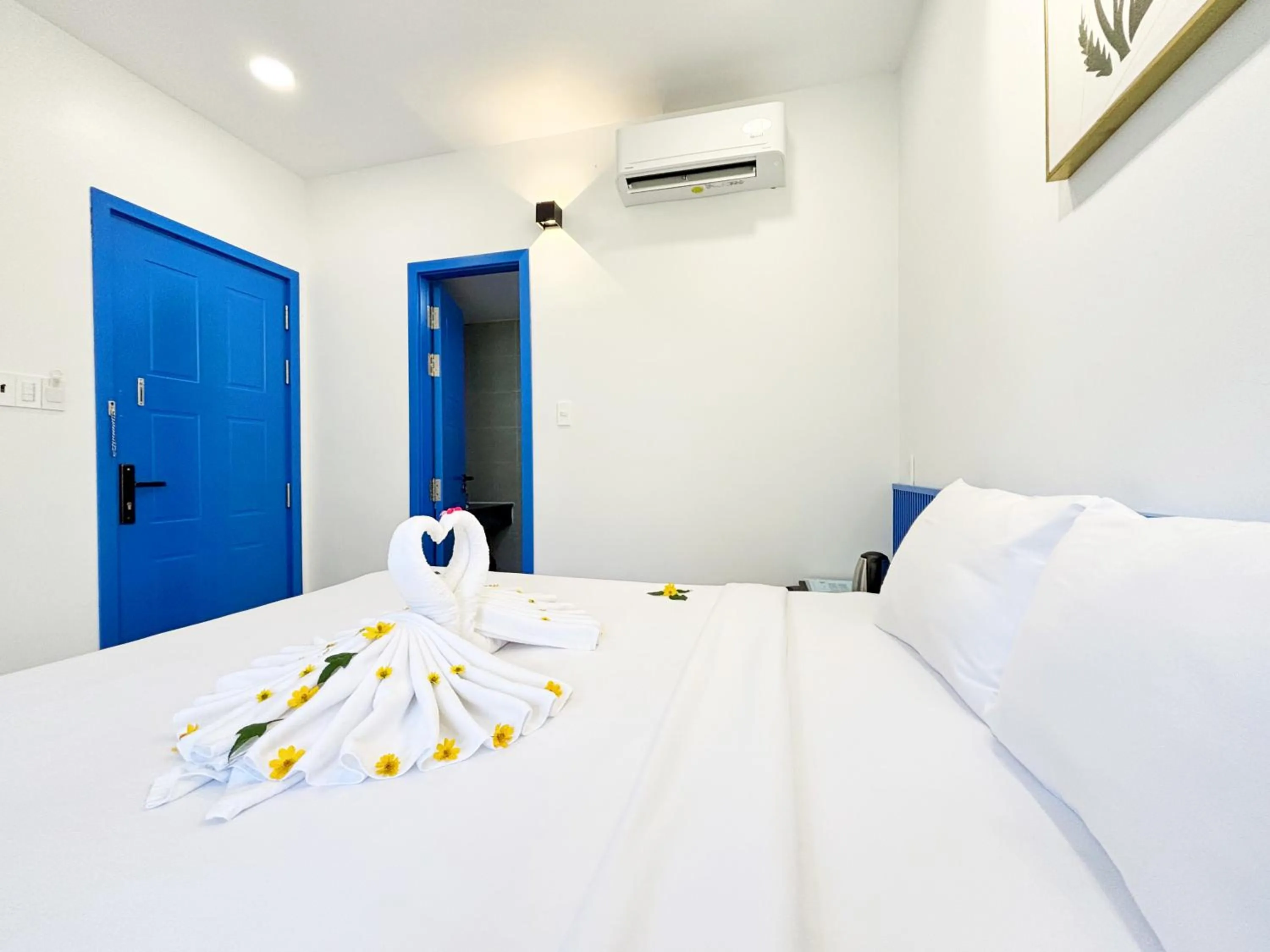 Bed in KIGI Beach Resort