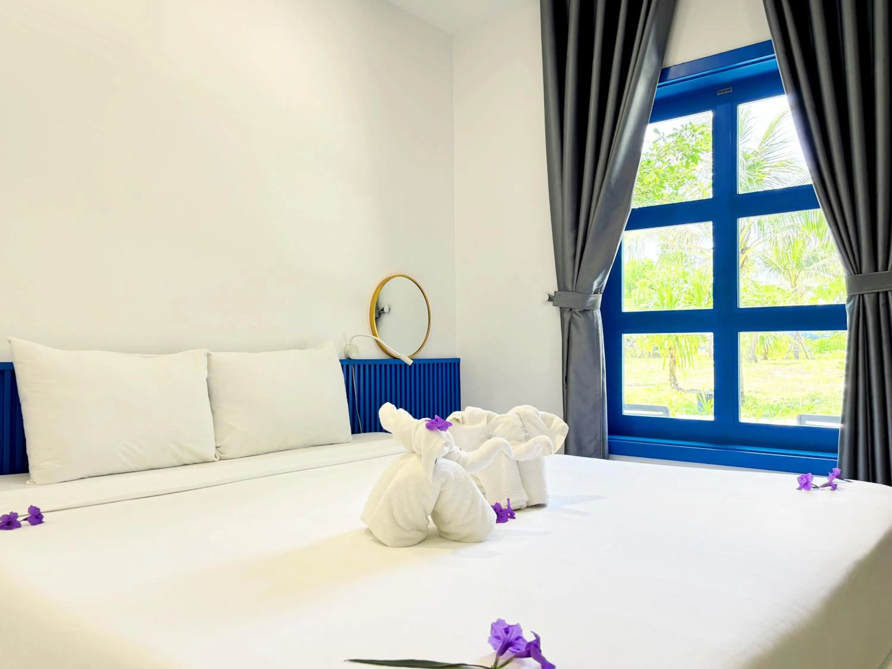 Bed in KIGI Beach Resort