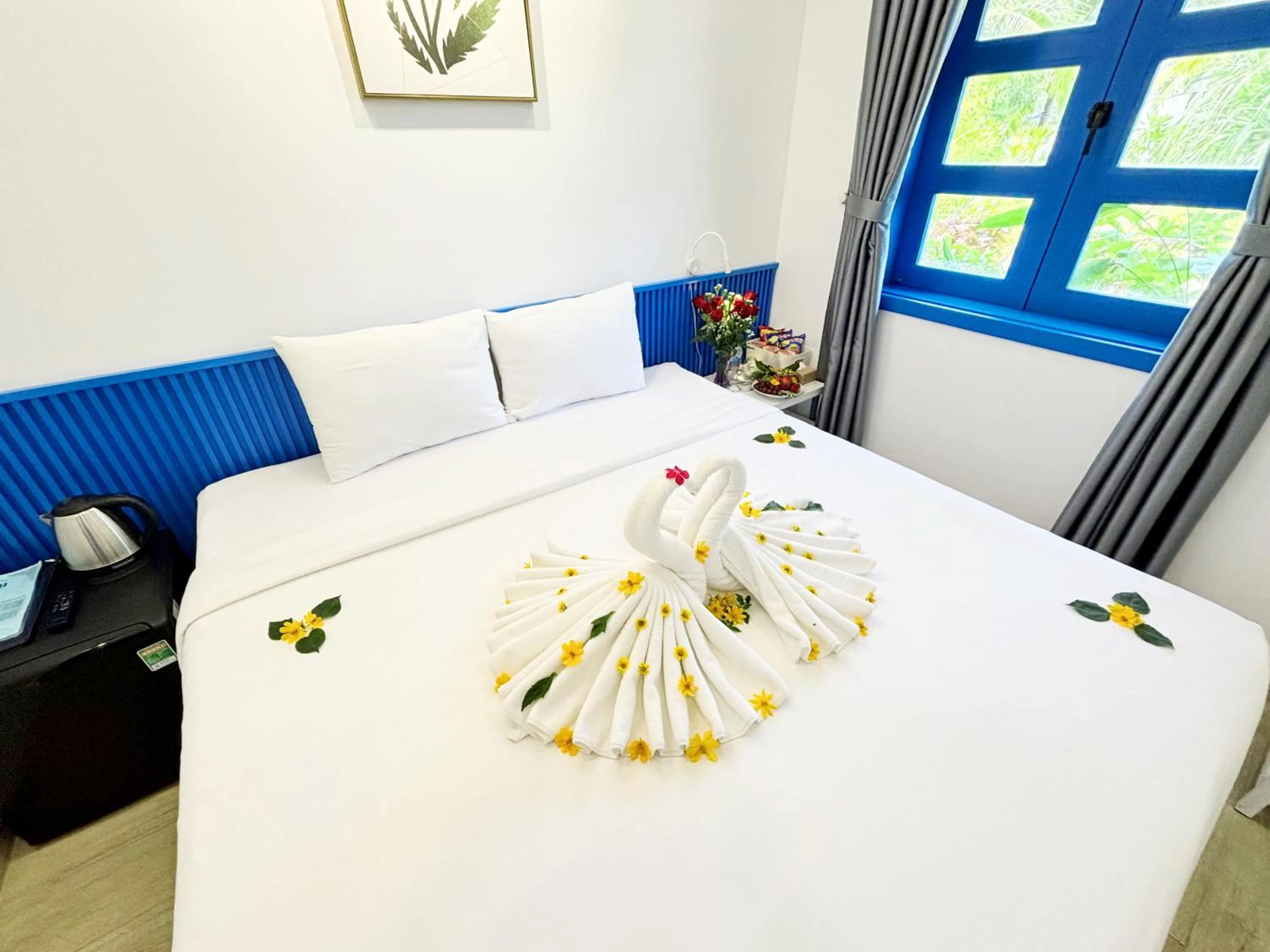 Bed in KIGI Beach Resort