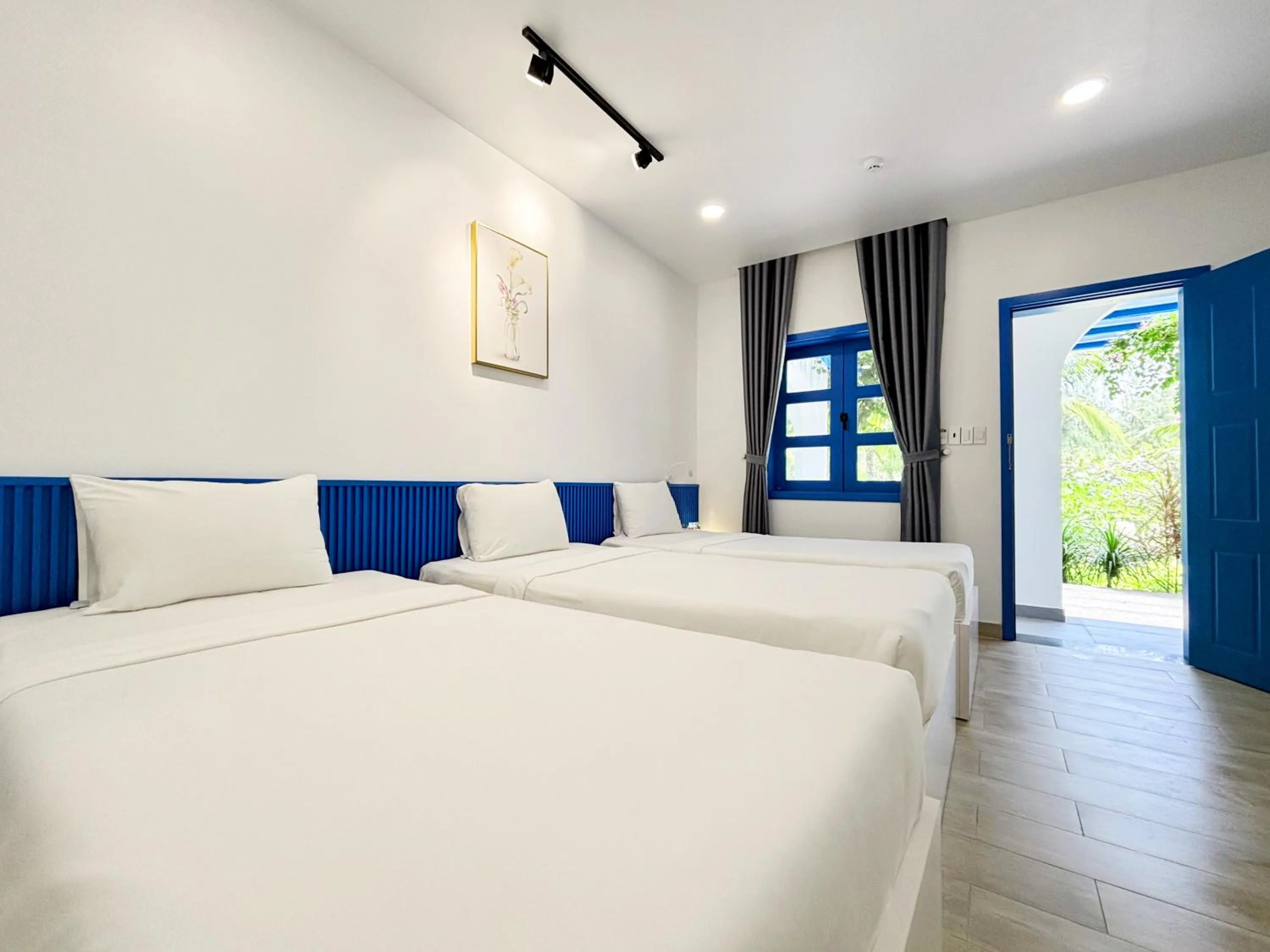 Bed in KIGI Beach Resort