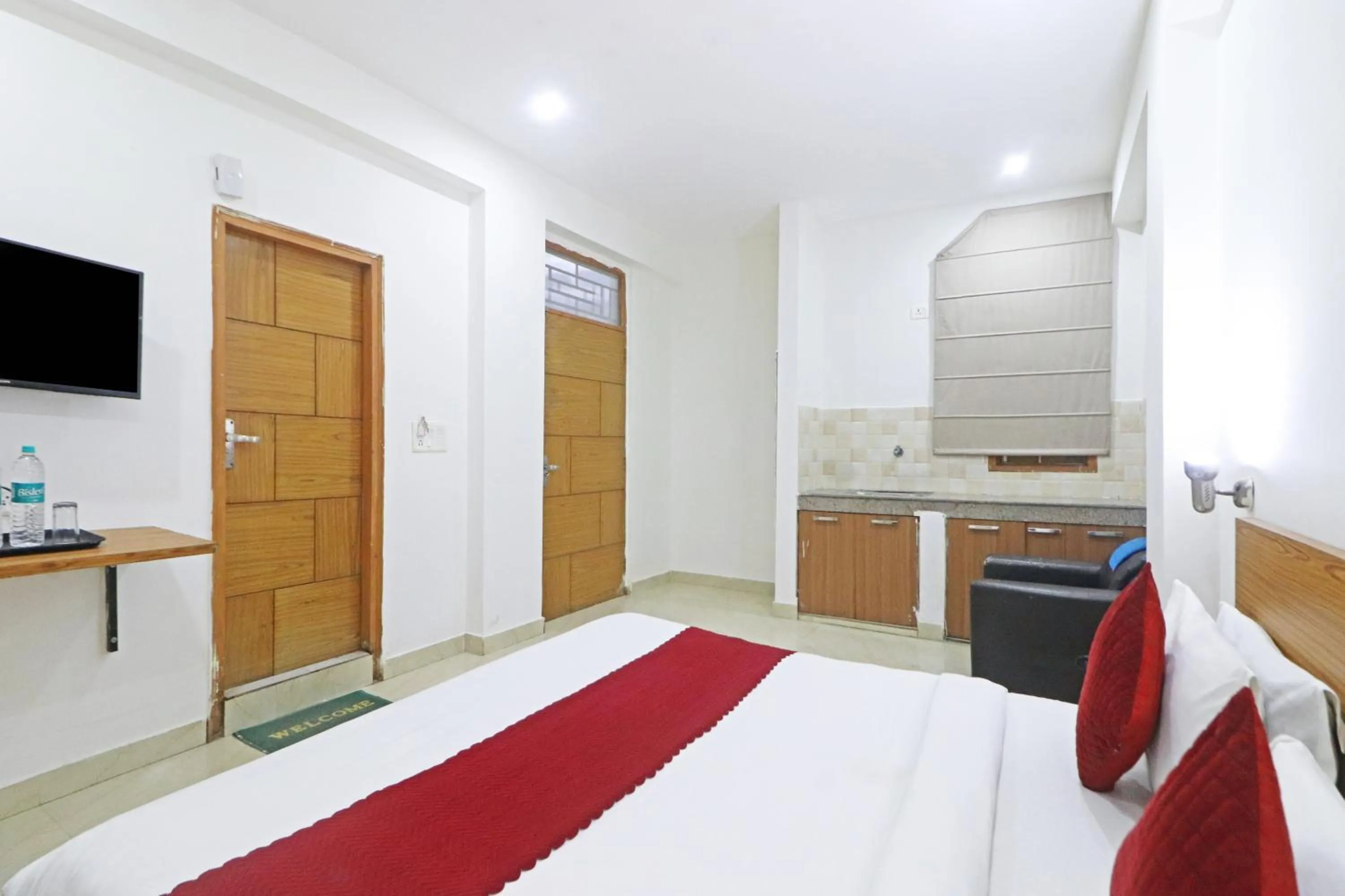 Bed in Mauryan Elite Hotel Chhatarpur Metro Station