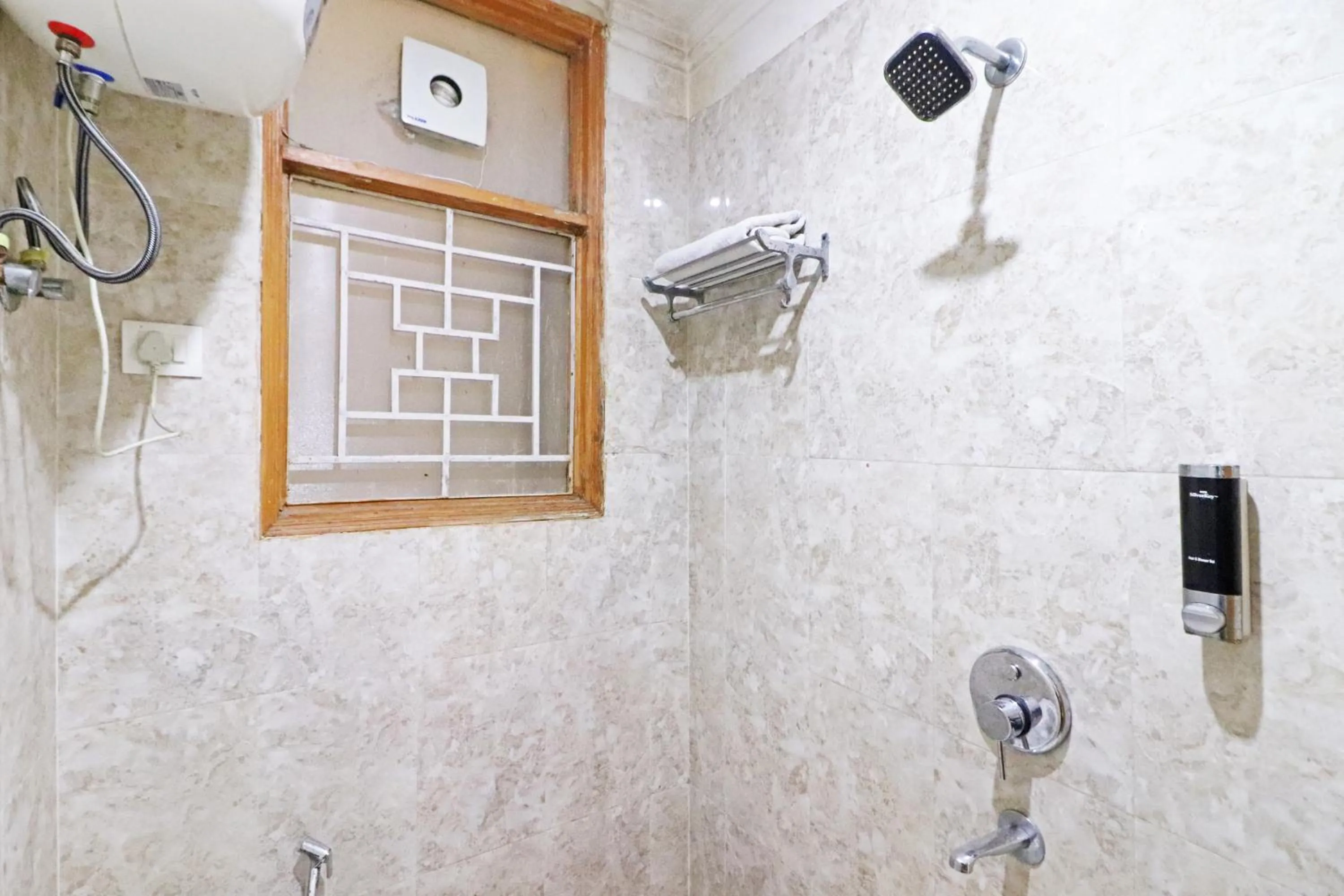 Shower in Mauryan Elite Hotel Chhatarpur Metro Station