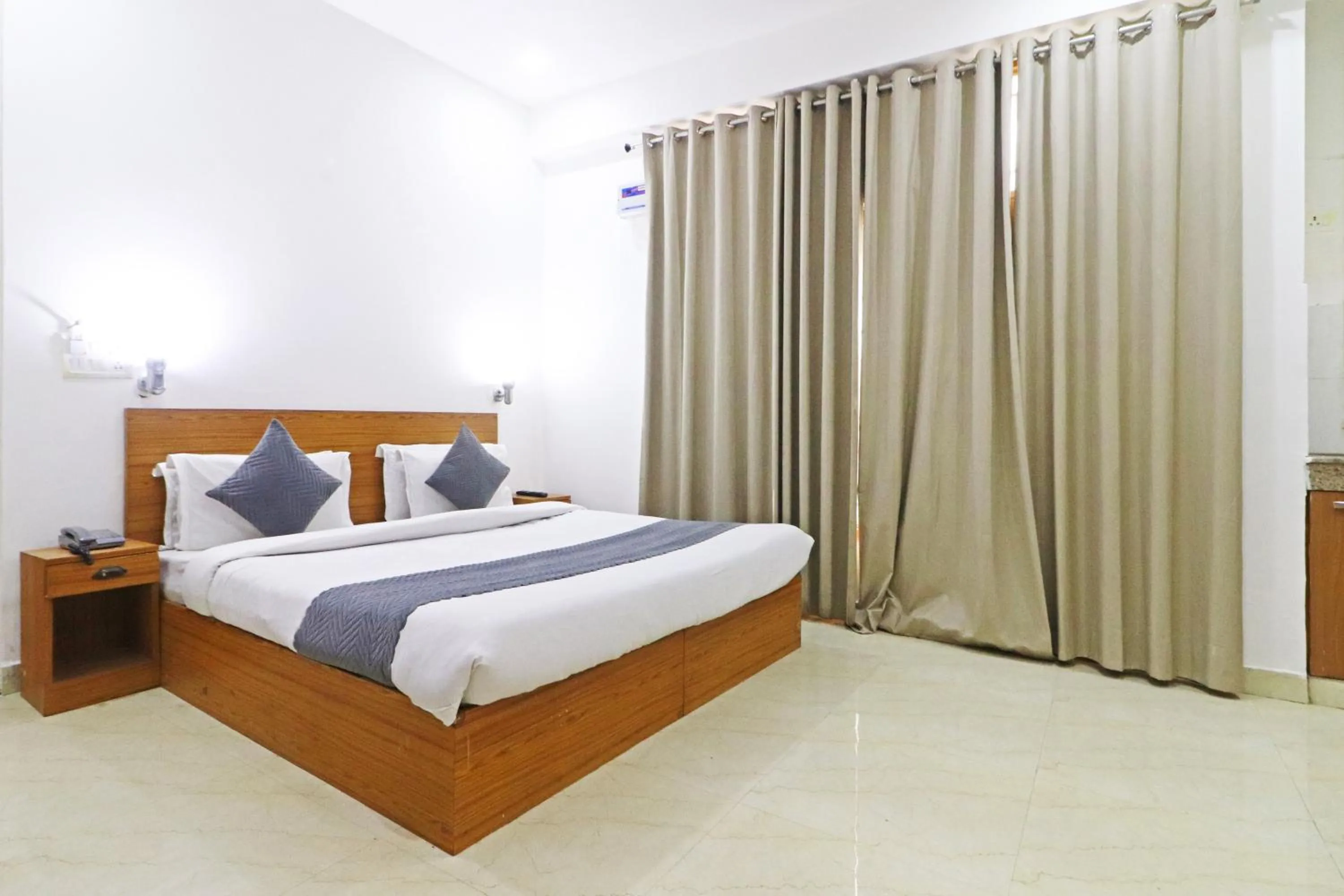 Bed in Mauryan Elite Hotel Chhatarpur Metro Station