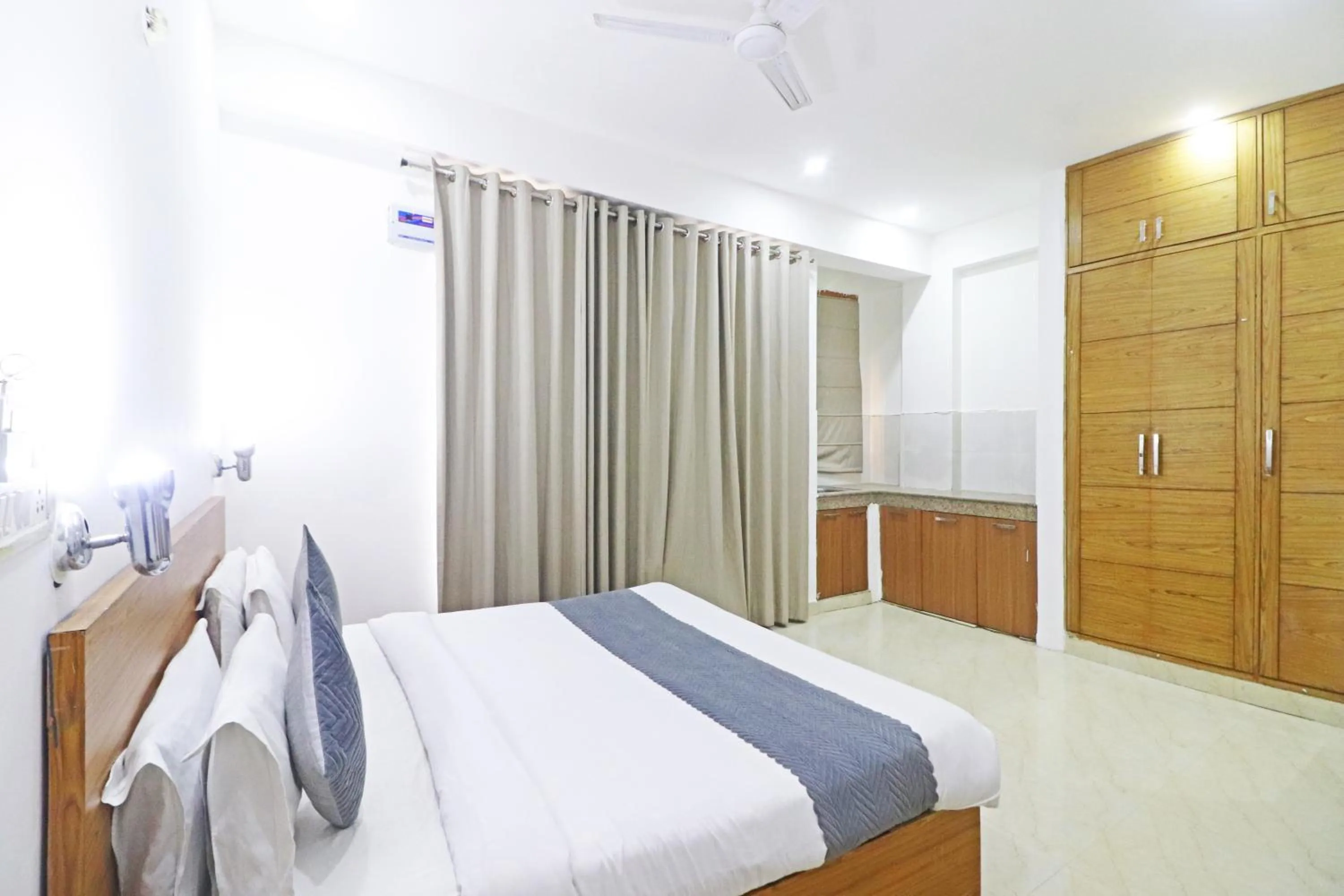 Bed in Mauryan Elite Hotel Chhatarpur Metro Station