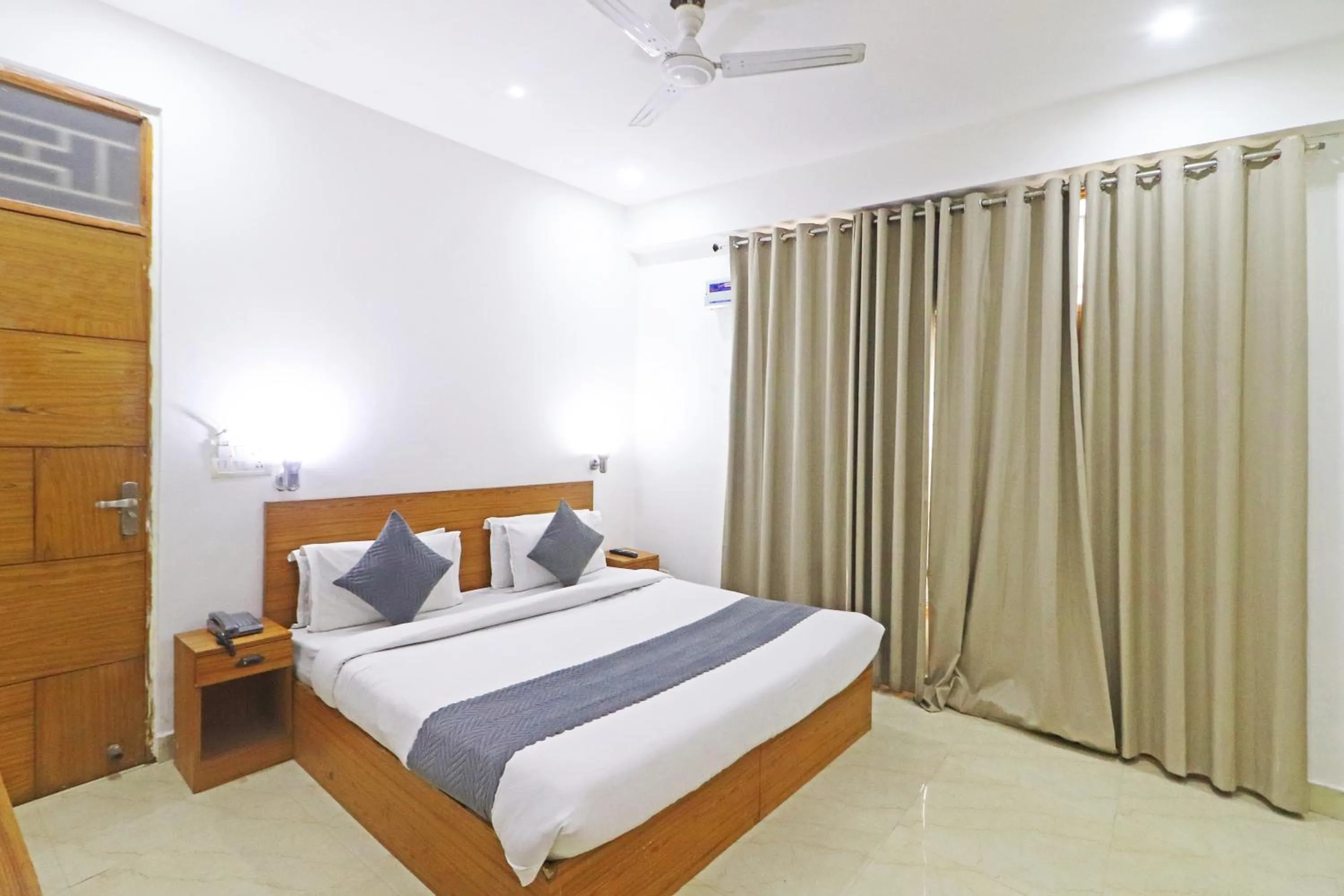 Bed in Mauryan Elite Hotel Chhatarpur Metro Station