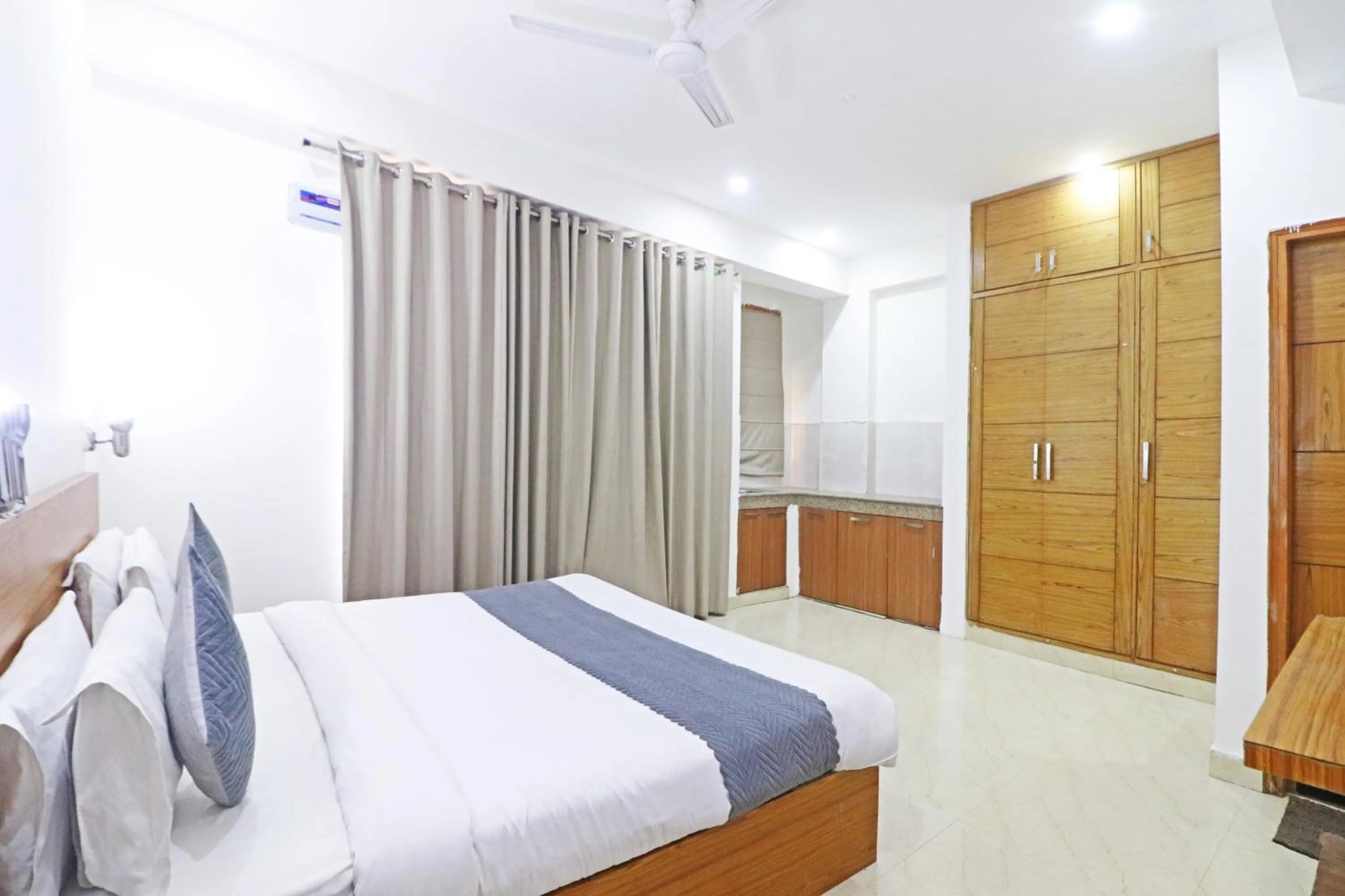Bed in Mauryan Elite Hotel Chhatarpur Metro Station