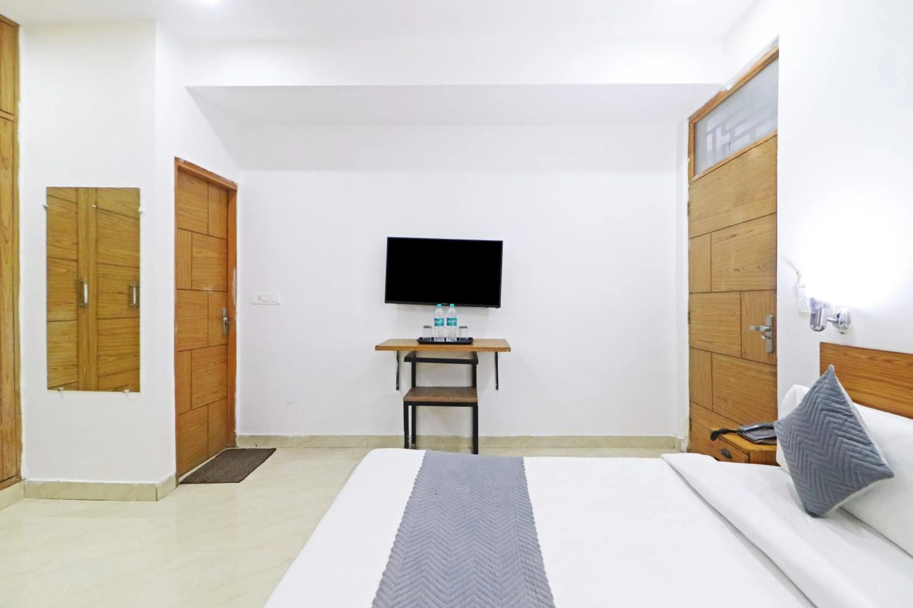 Bed in Mauryan Elite Hotel Chhatarpur Metro Station