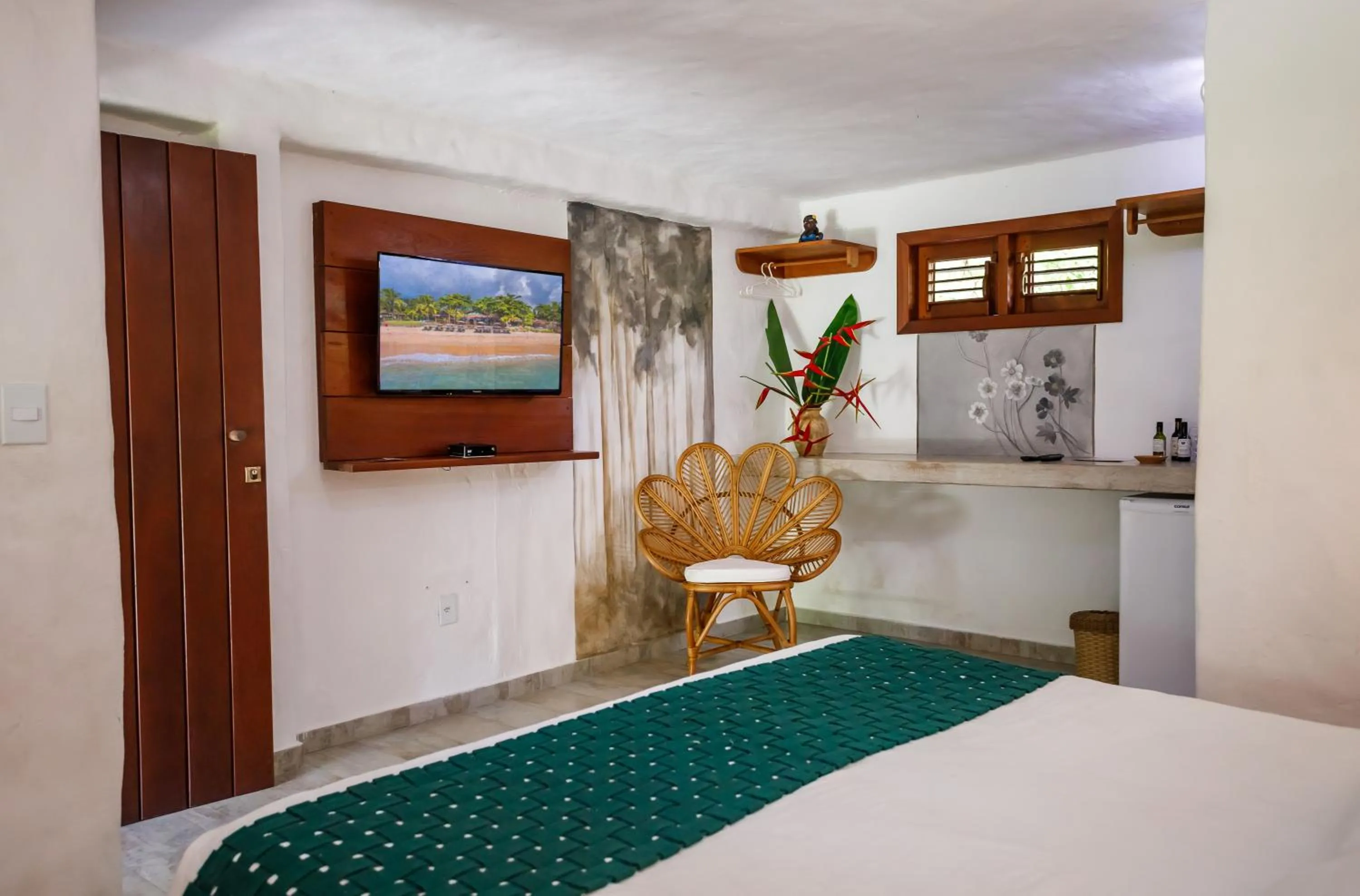 Bed in Pousada Rigatoni