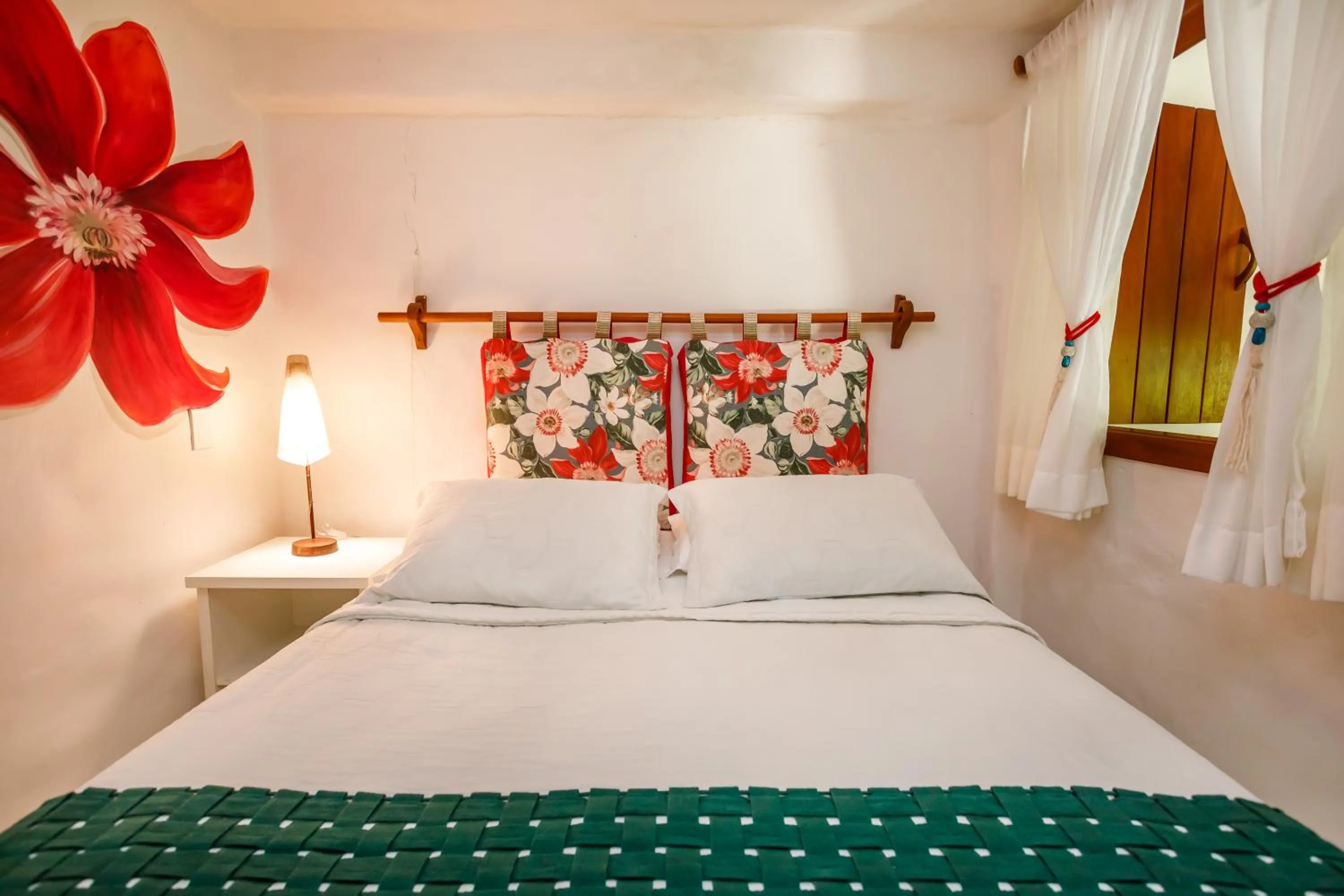 Bed in Pousada Rigatoni