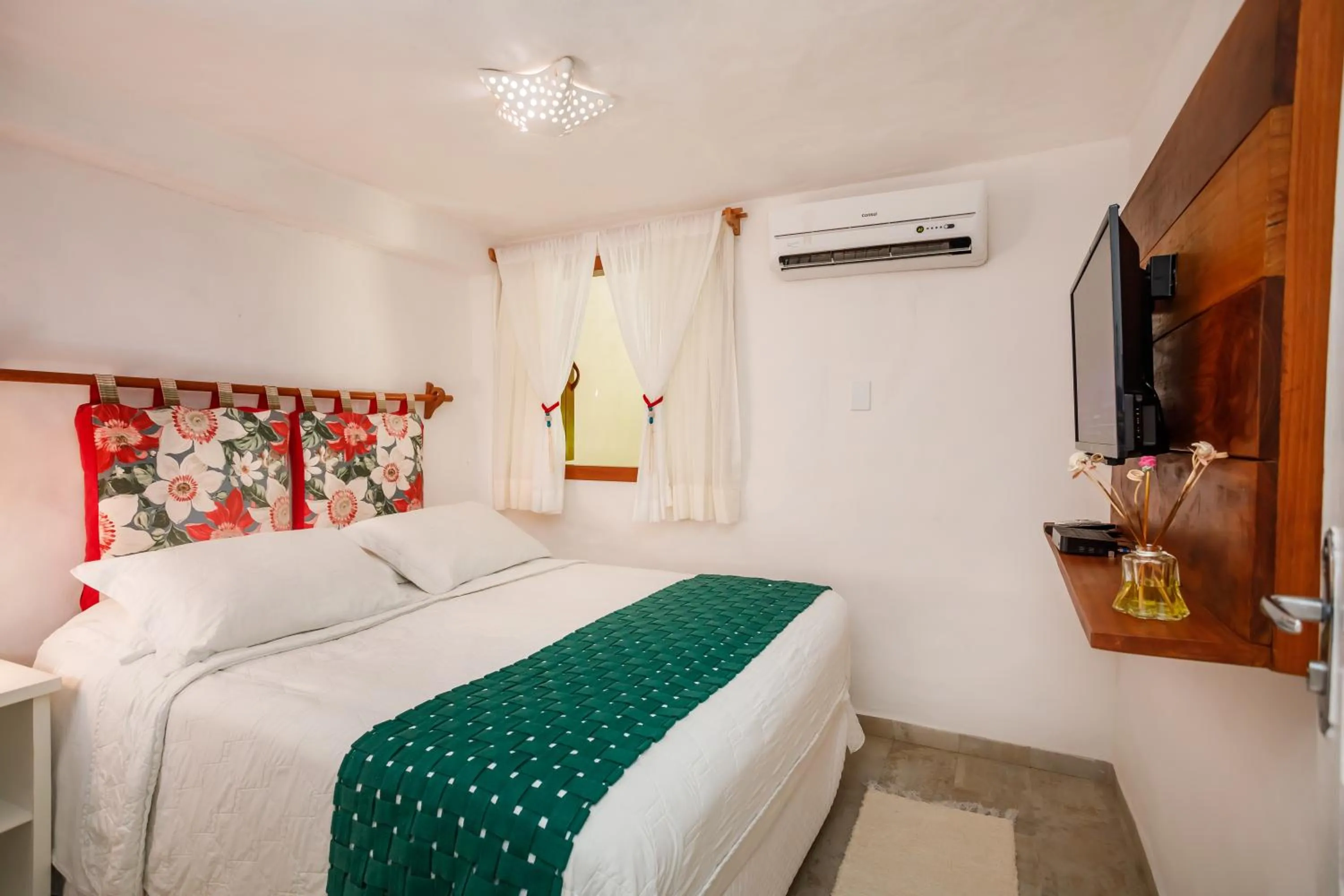 Bed in Pousada Rigatoni