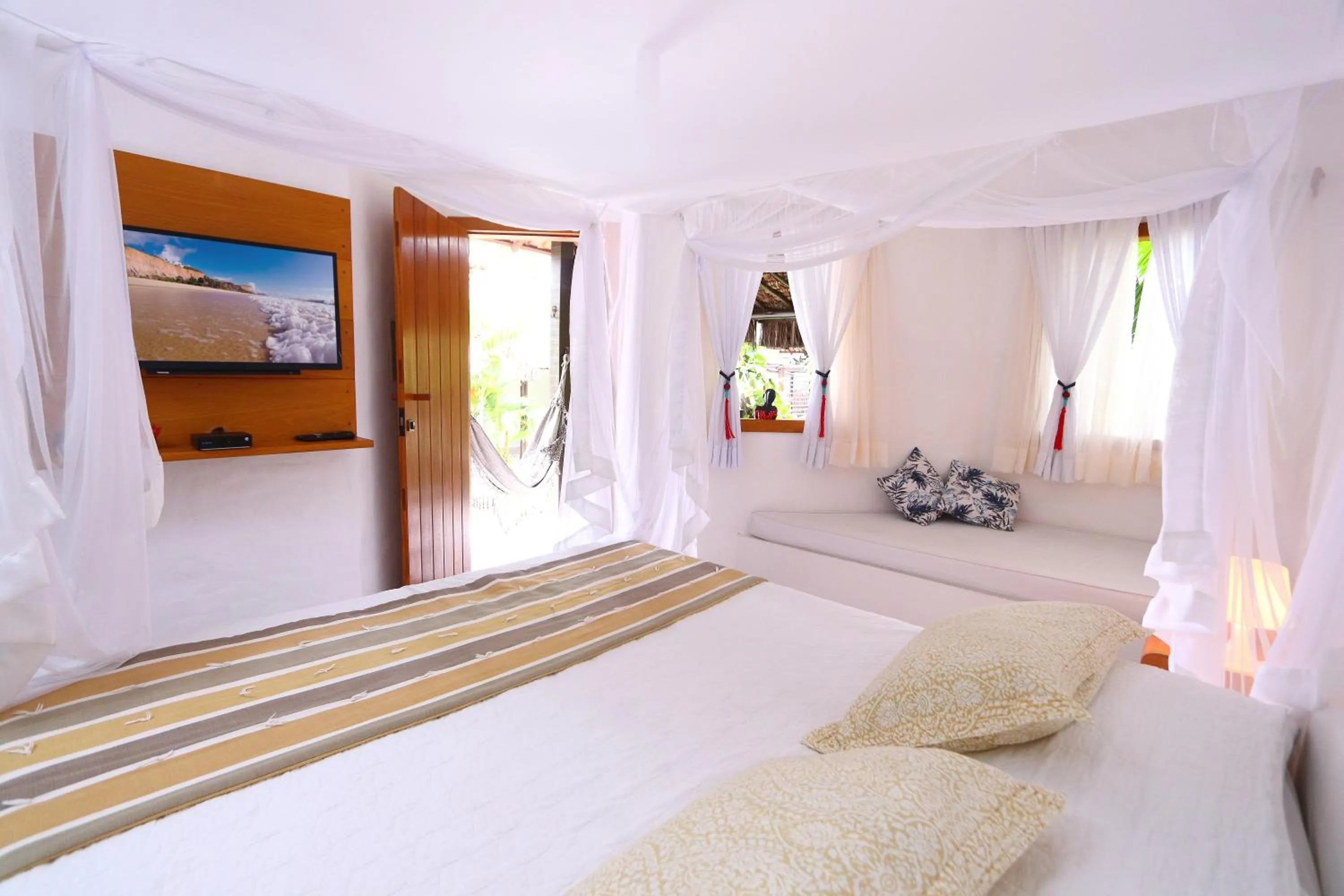 Bed in Pousada Rigatoni