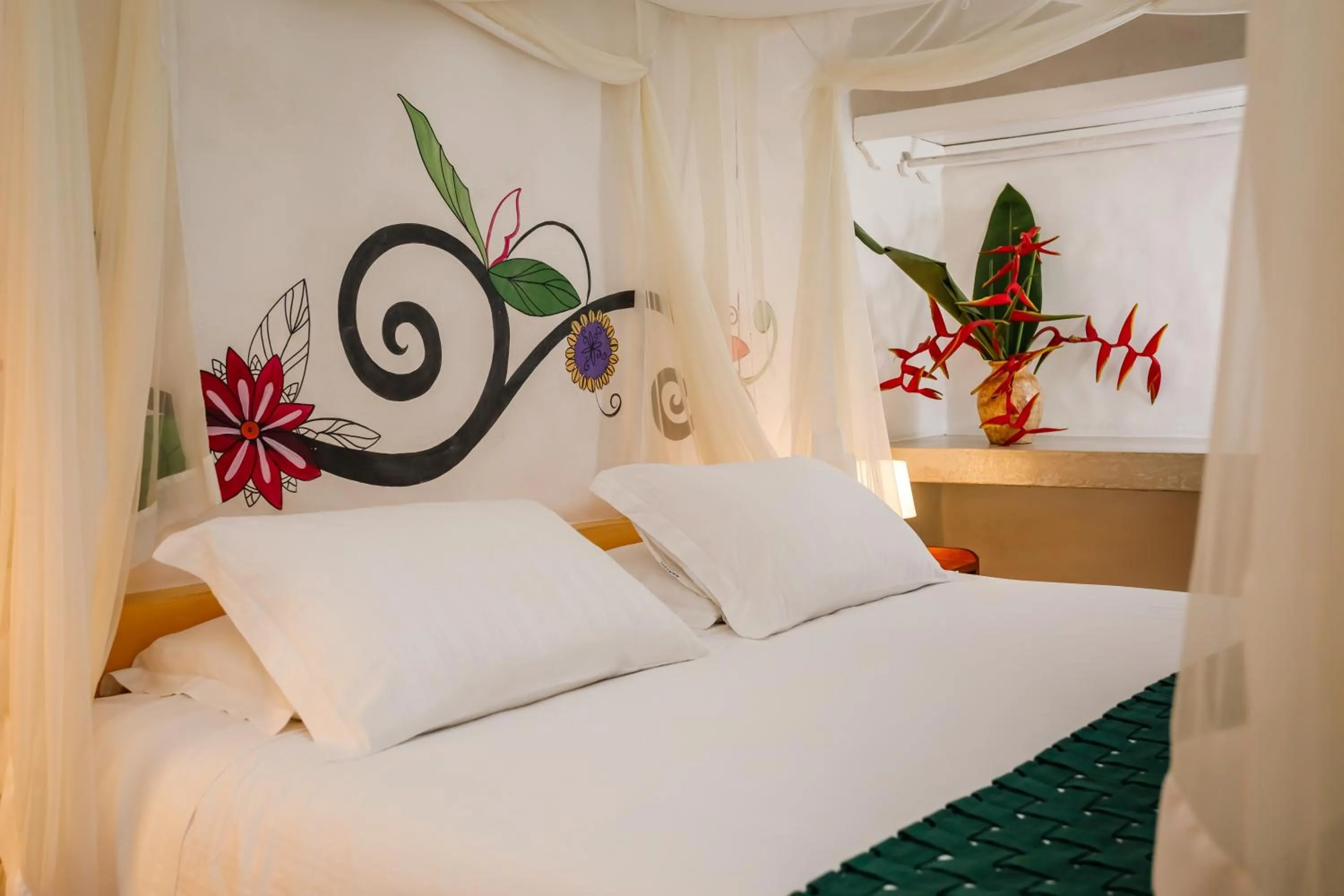 Bed in Pousada Rigatoni