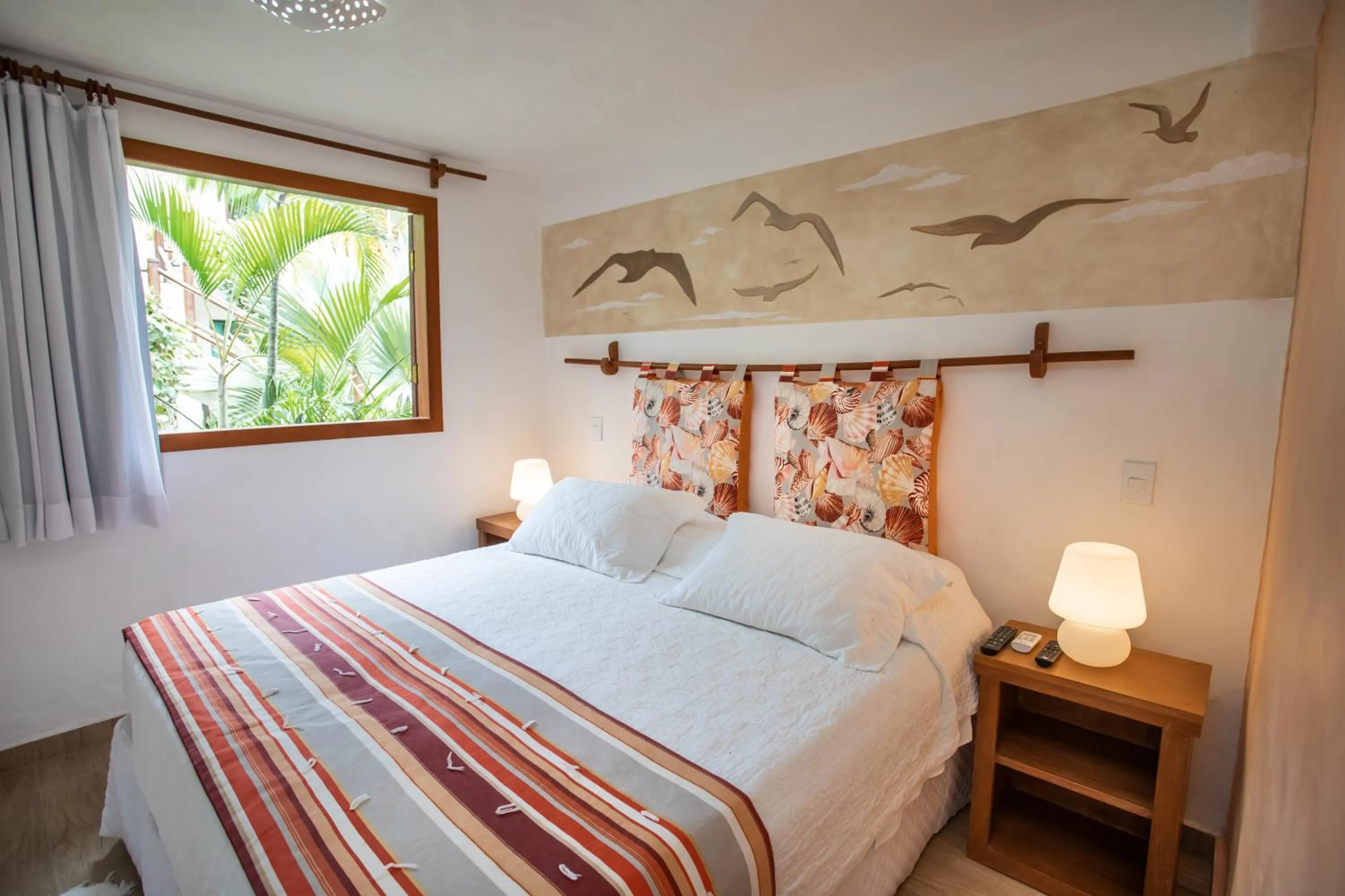 Bed in Pousada Rigatoni