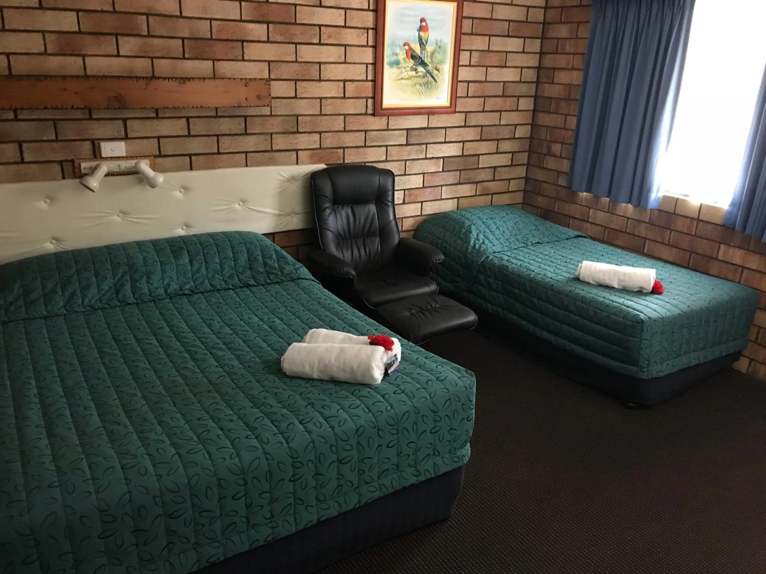 Bed in Miles Outback Motel