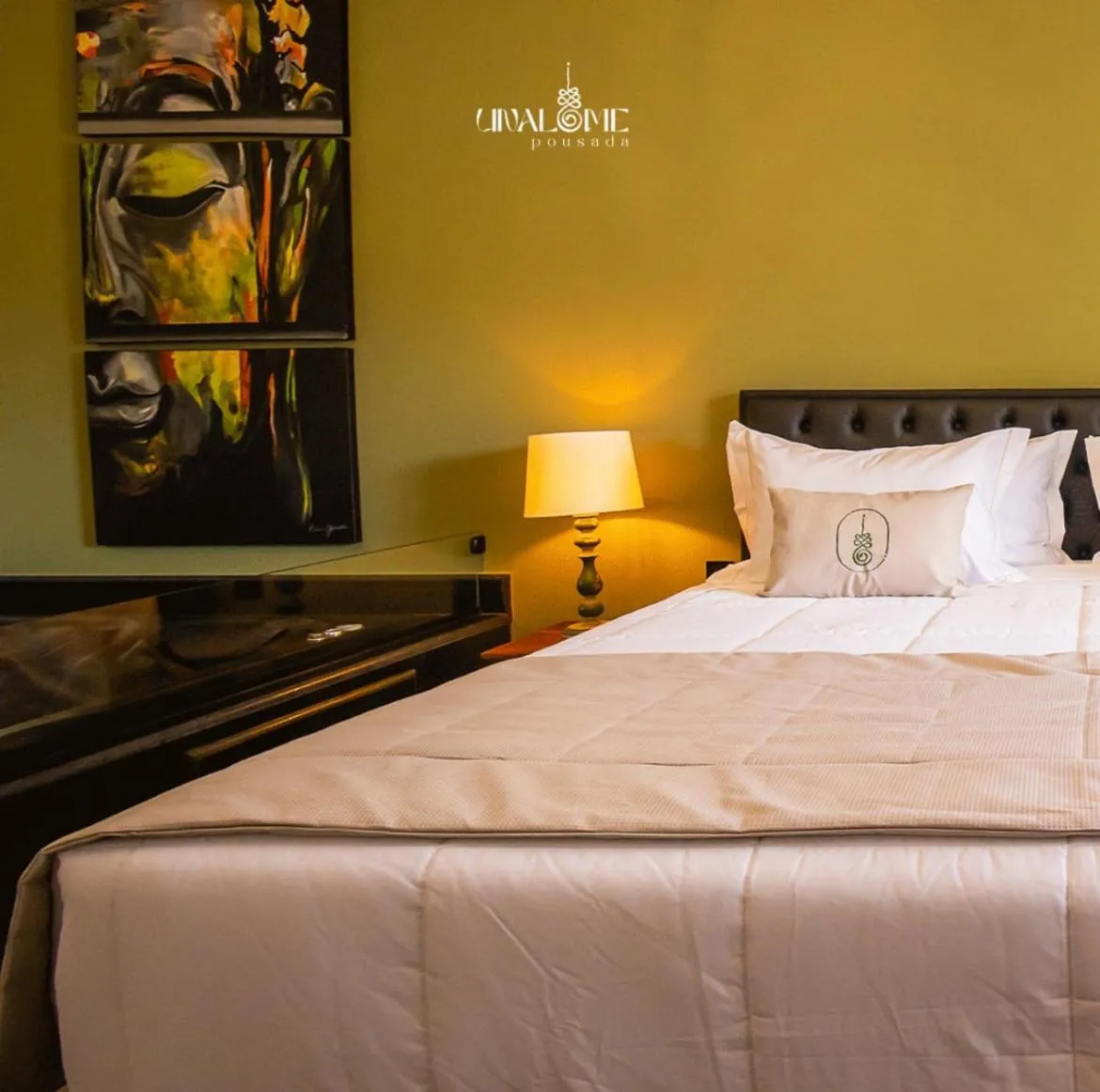 Bed in Unalome Pousada