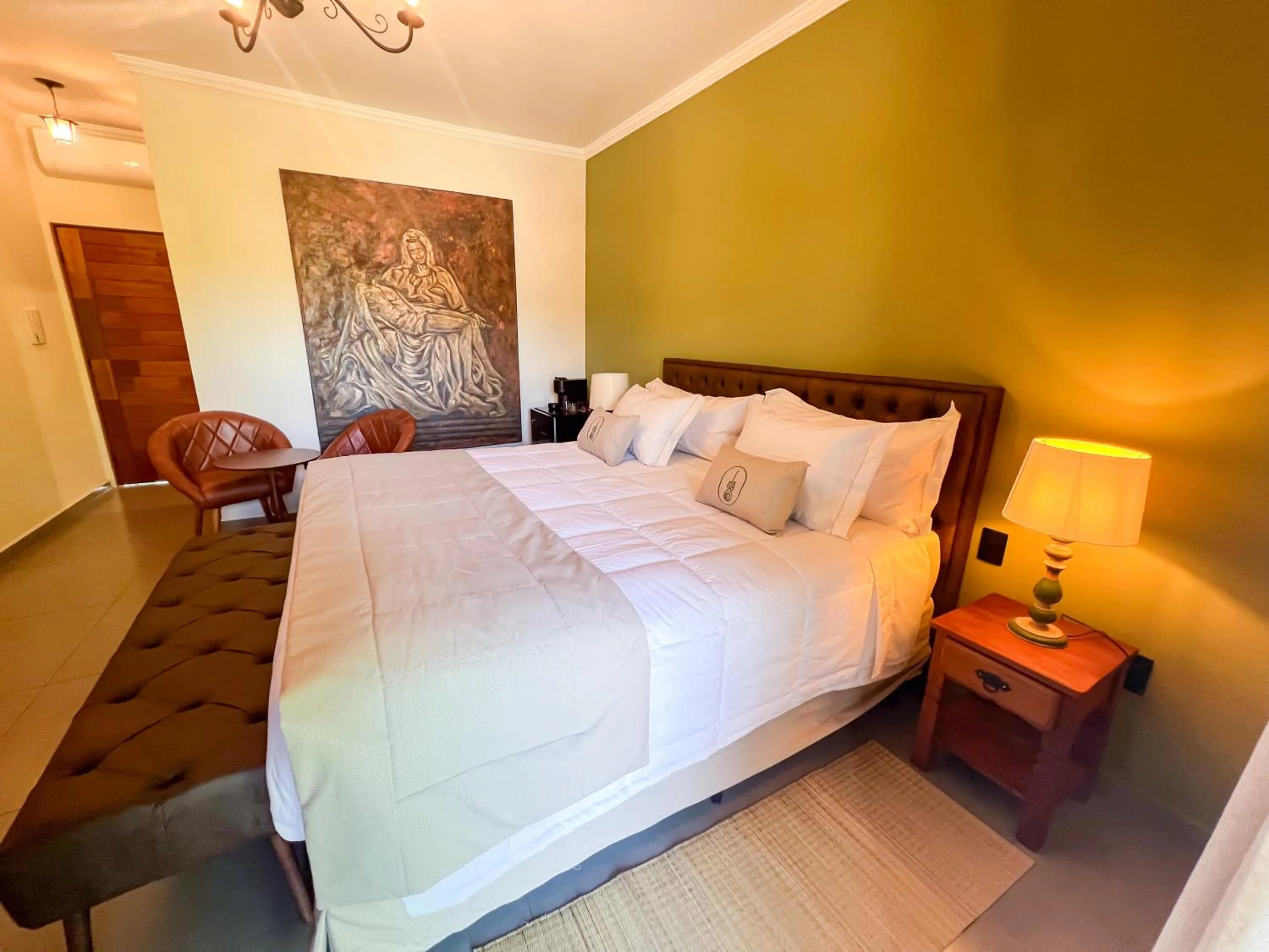 Bed in Unalome Pousada