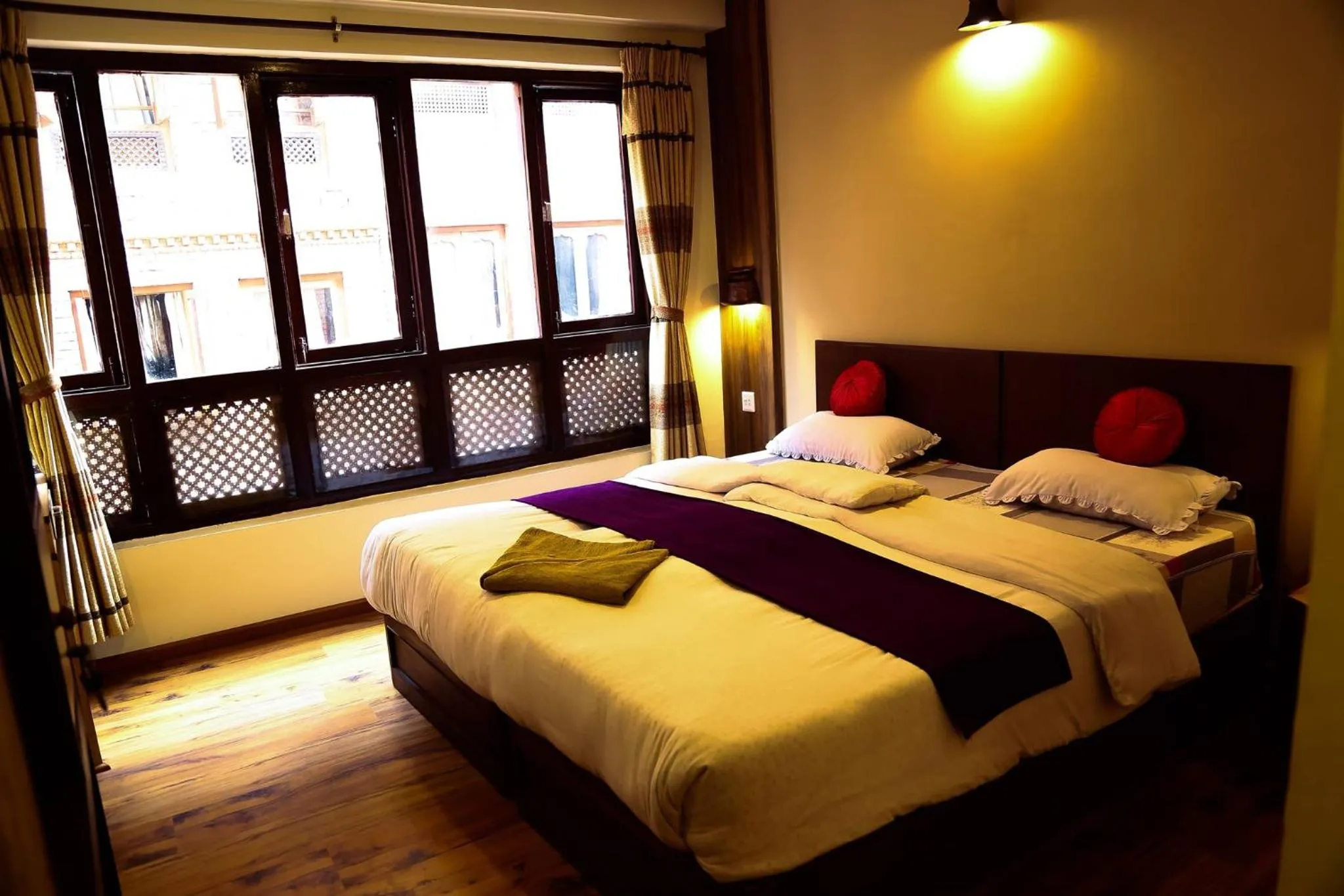 Bed in Kumari Guest House