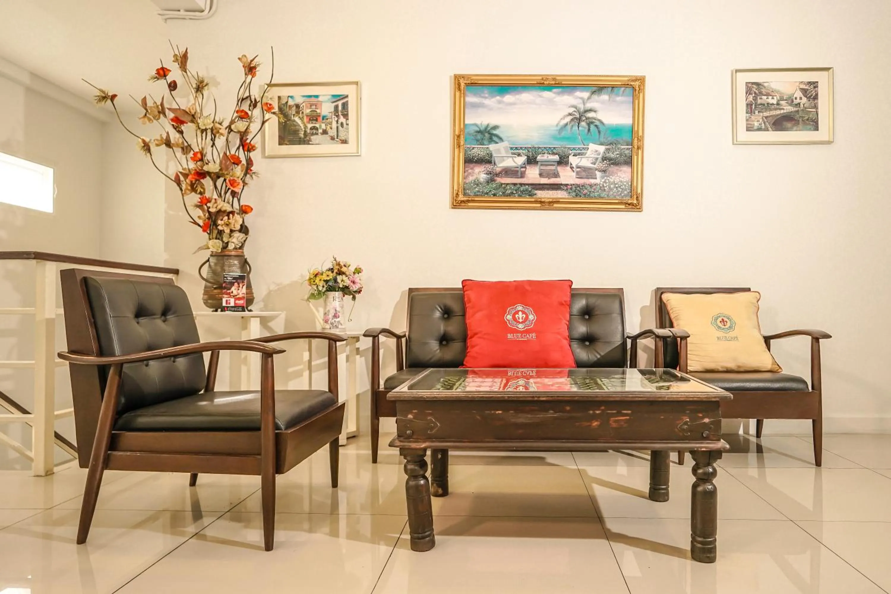 Seating area in Blue cafe Apartments