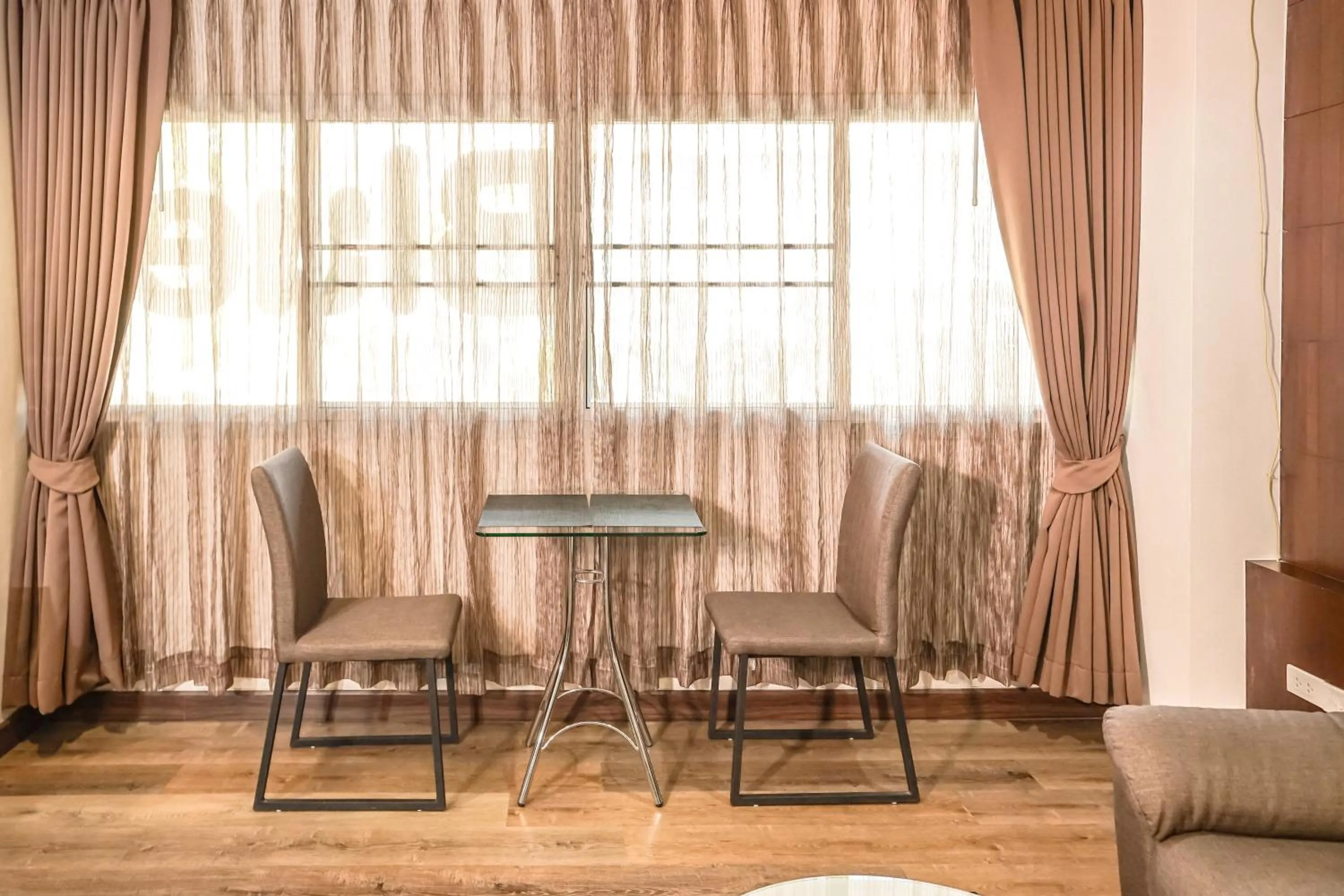 Seating area in Blue cafe Apartments