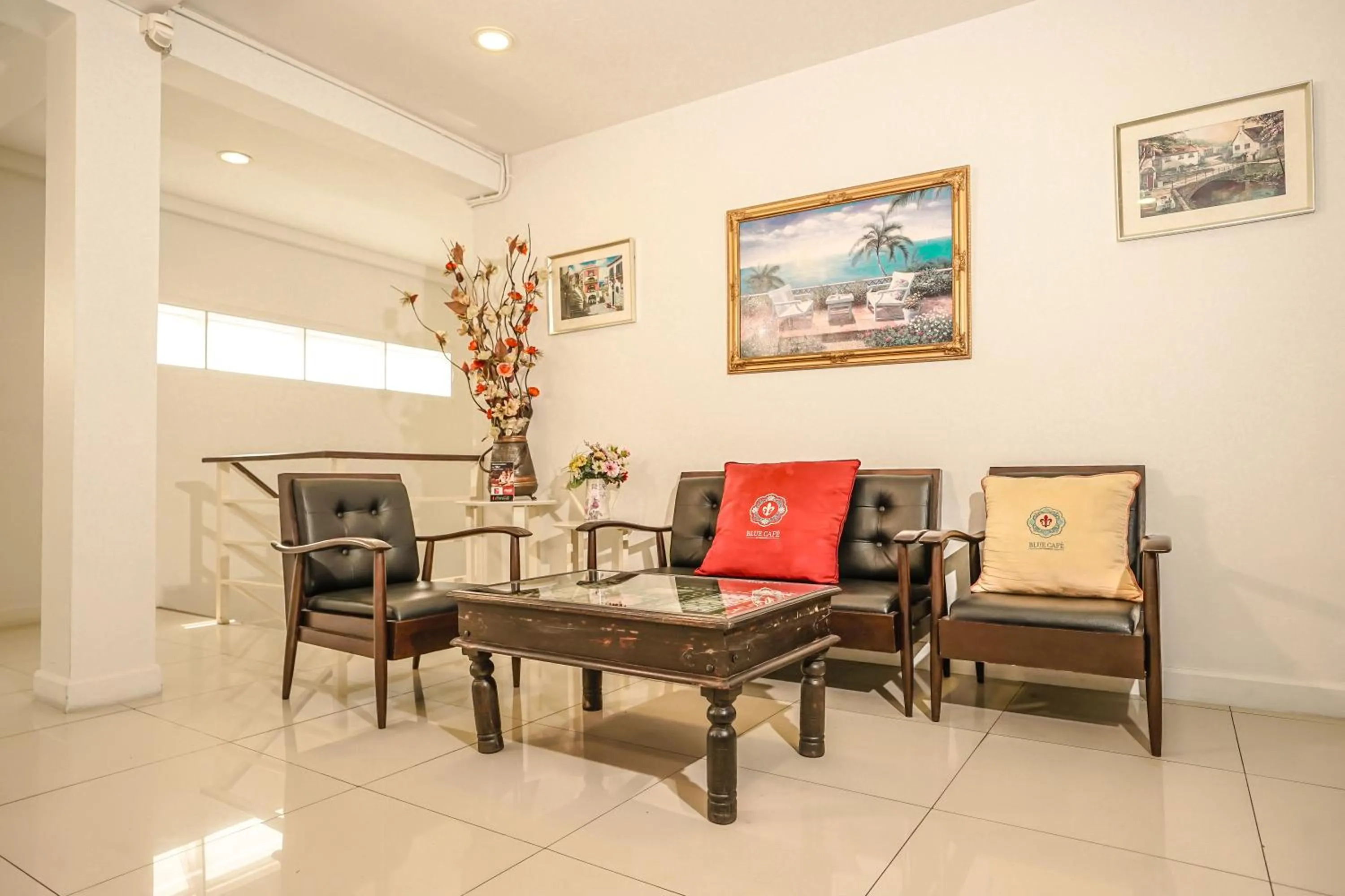 Seating area in Blue cafe Apartments