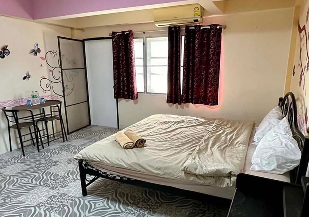 Bed in Sea View Jomtien Guest House