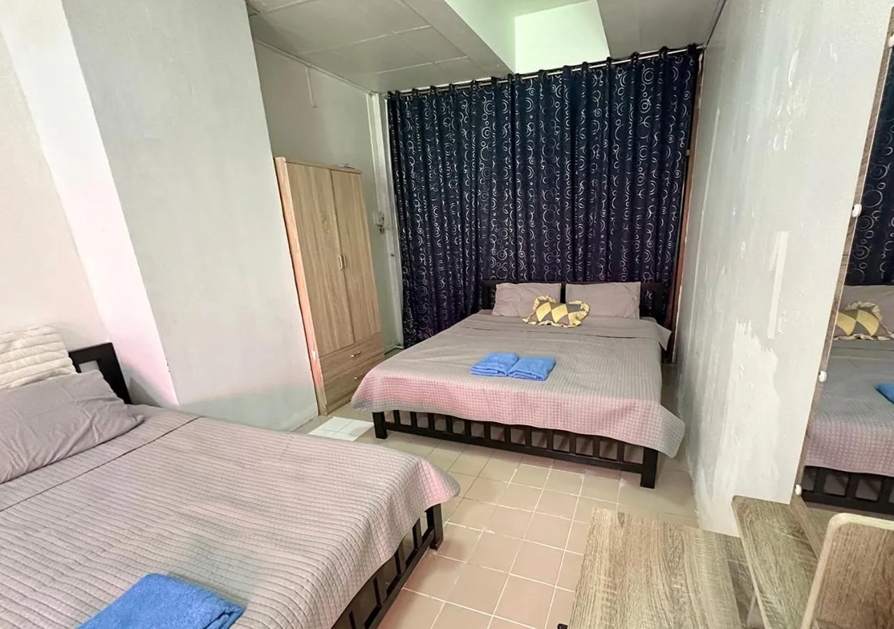 Bed in Sea View Jomtien Guest House