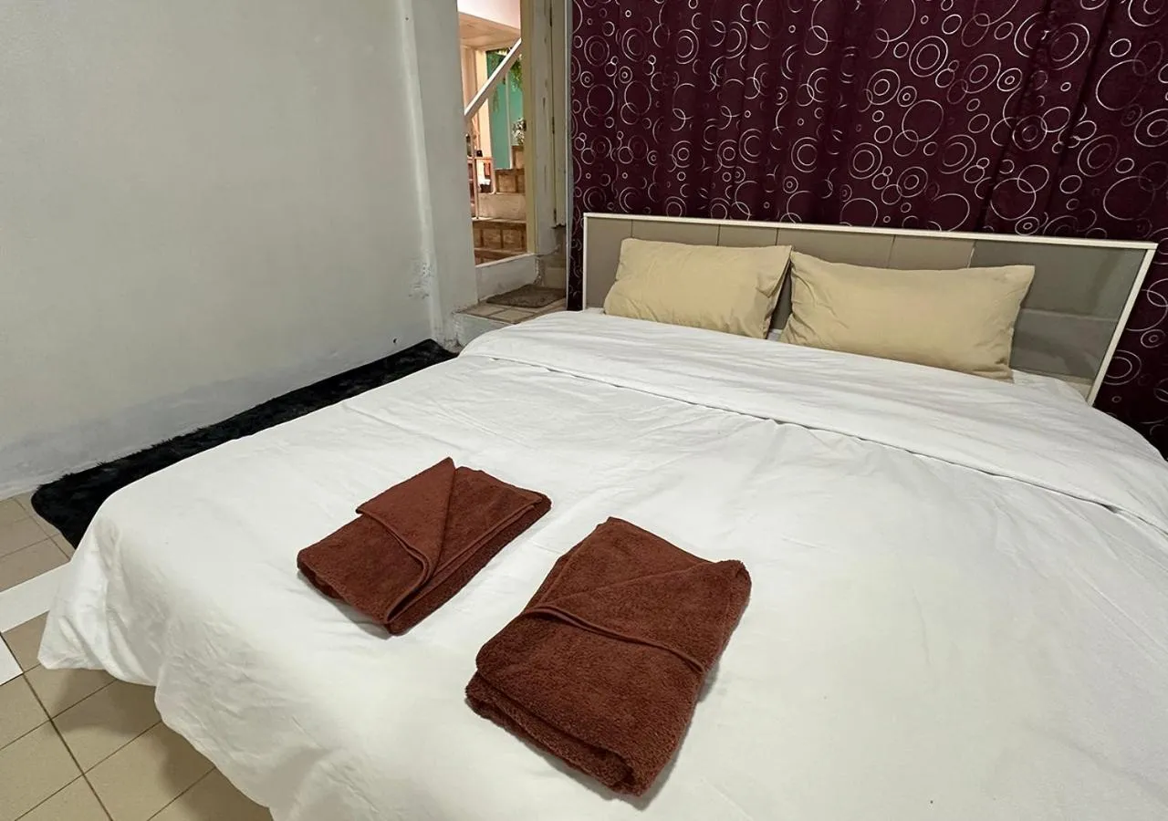 Bed in Sea View Jomtien Guest House