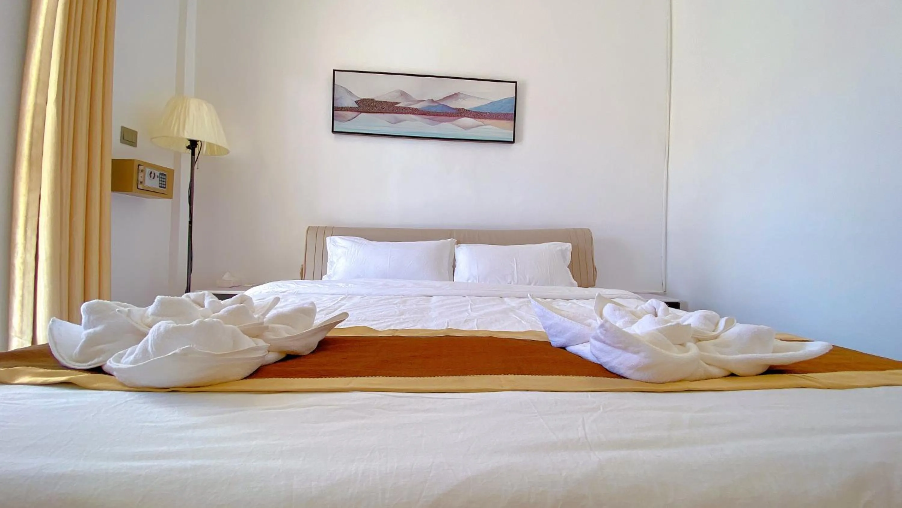 Bed in Green Mango Resort