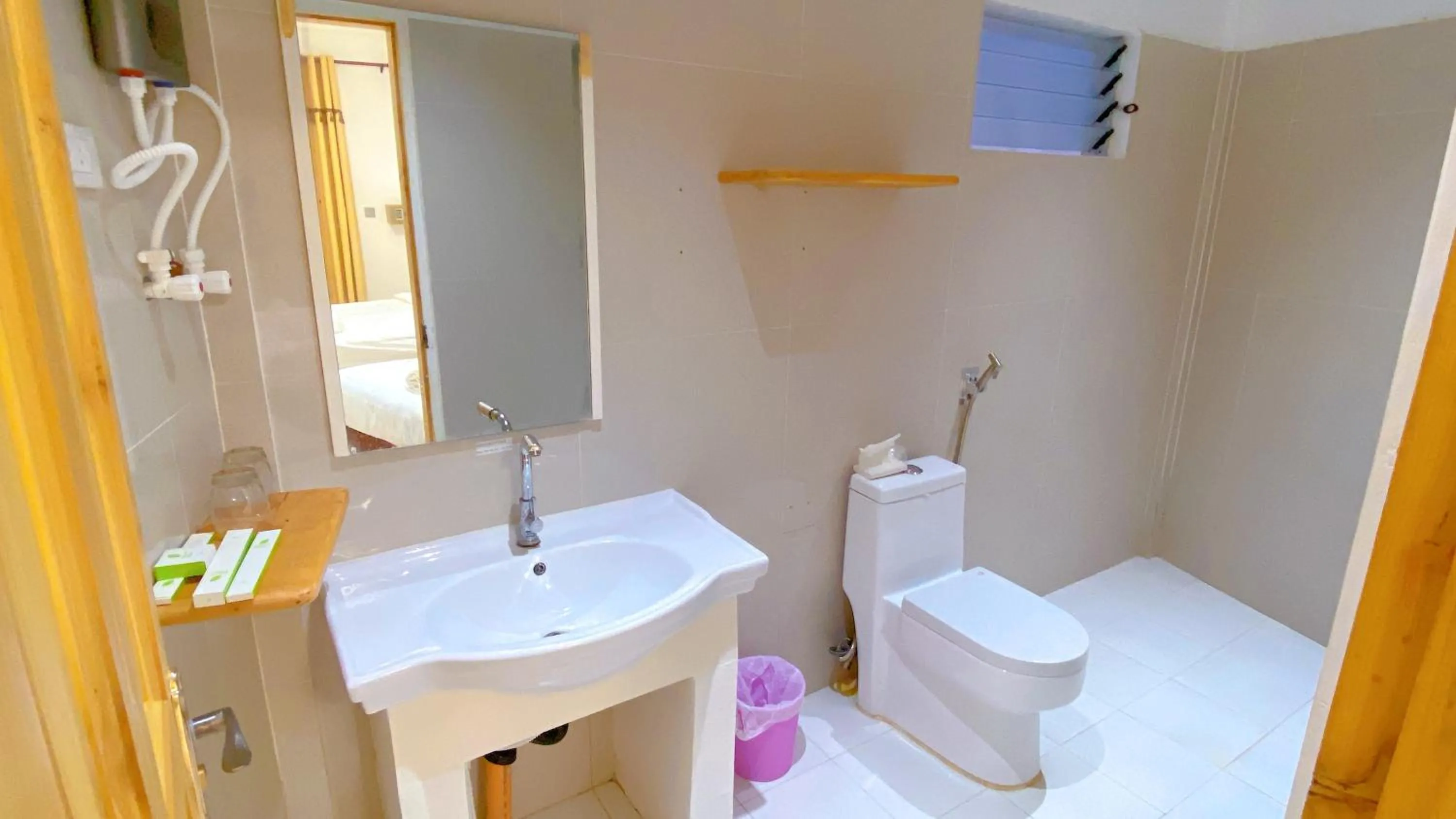 Toilet in Green Mango Resort