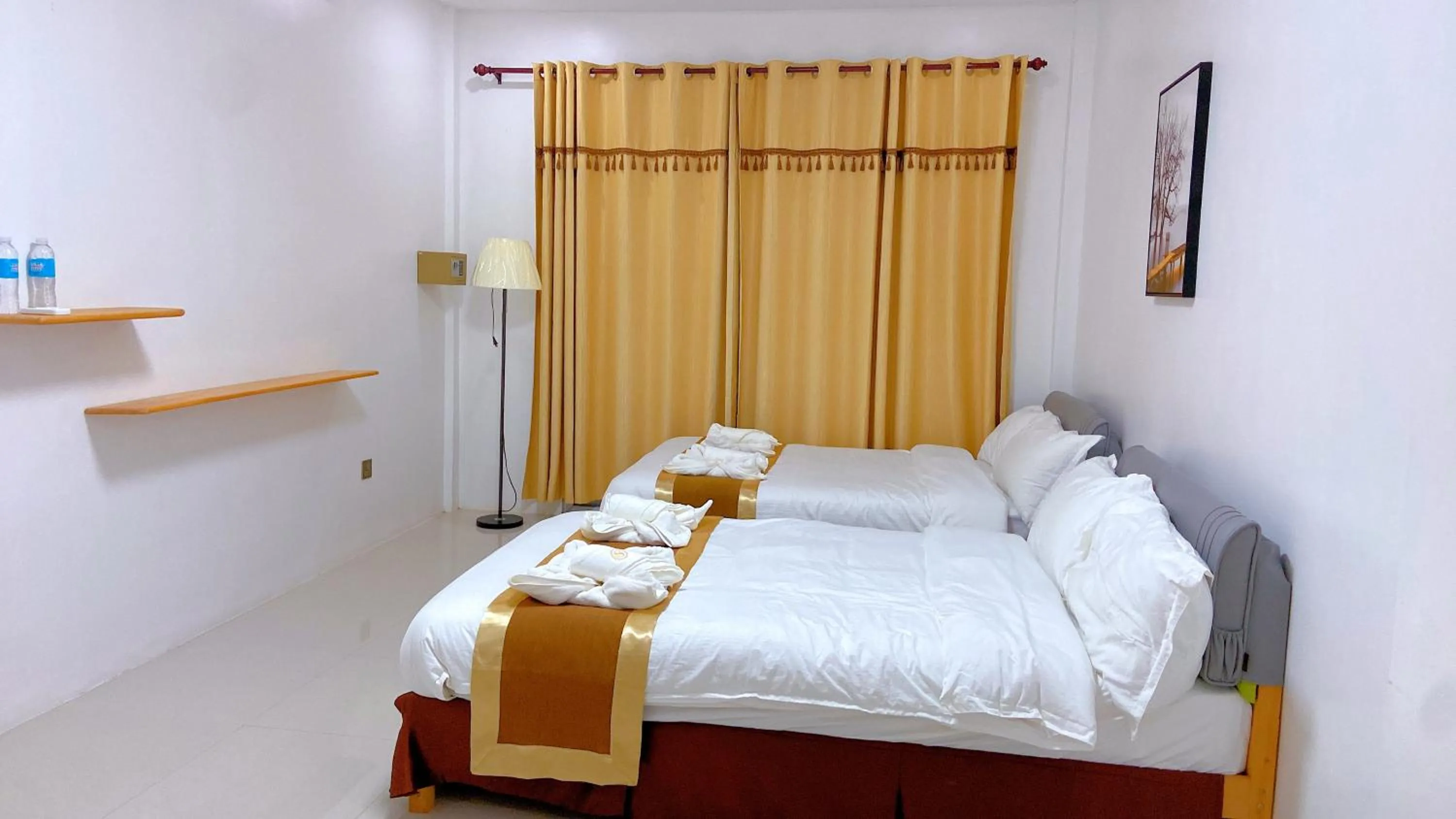 Bed in Green Mango Resort