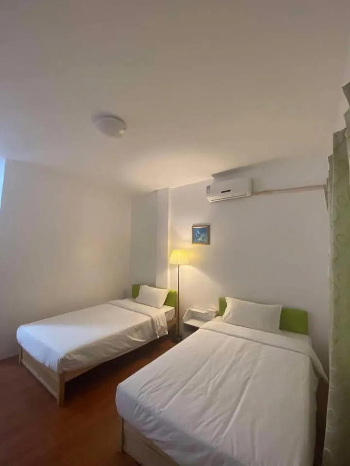 Bed in Green Mango Resort