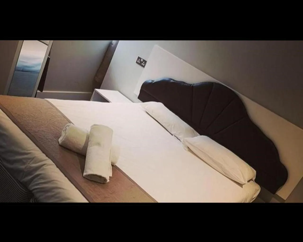 Bedroom, Bed in The R Inn Hotel