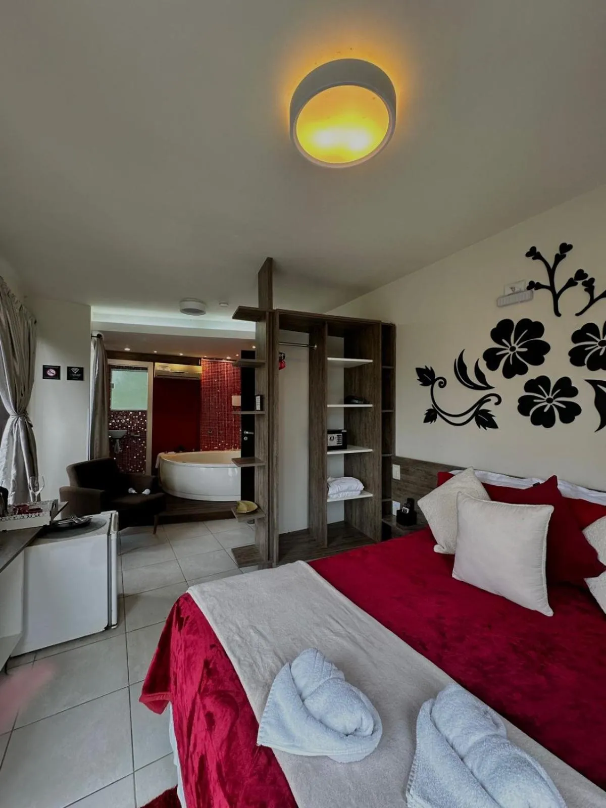 Bed in Bombinhas Guest House